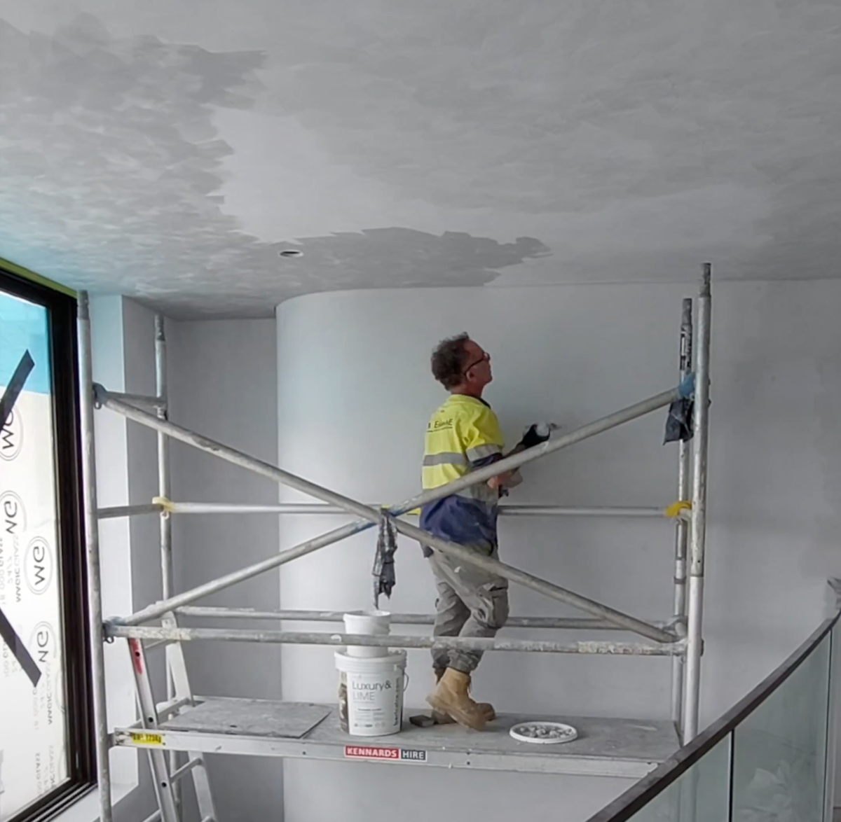 Applying stucco on walls