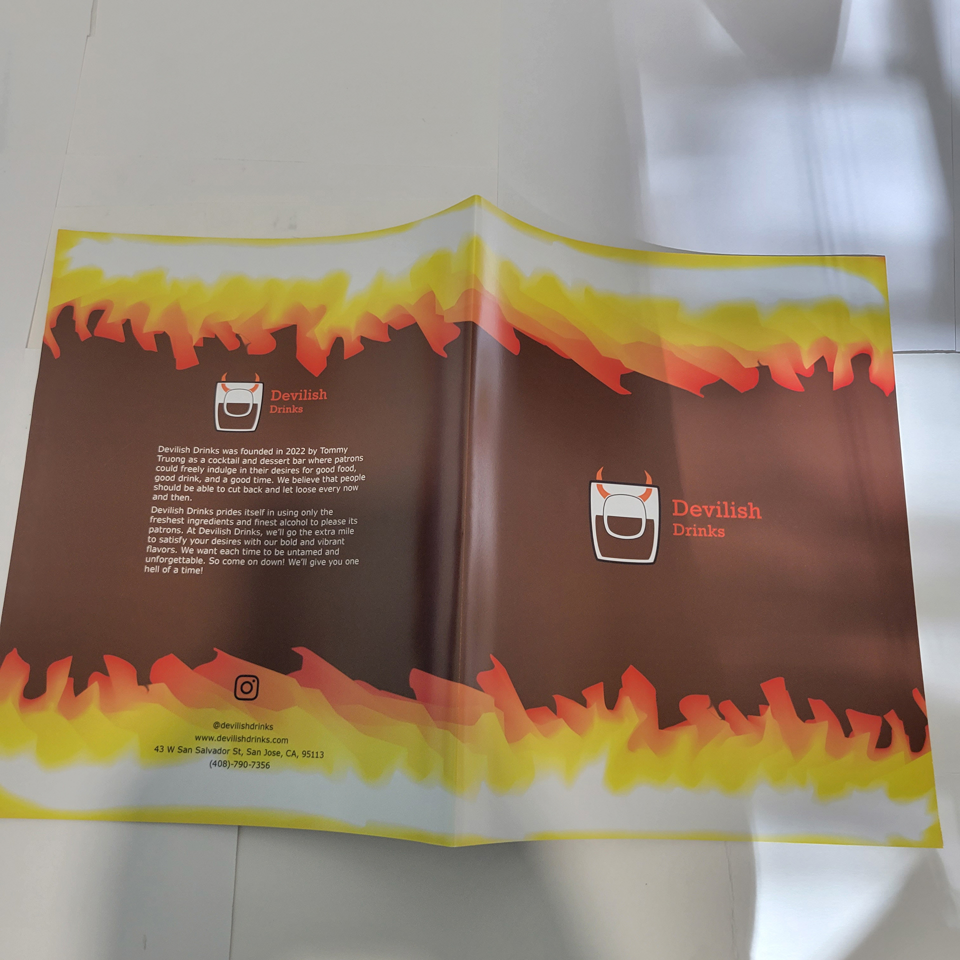 Front and back covers of the physical menu.