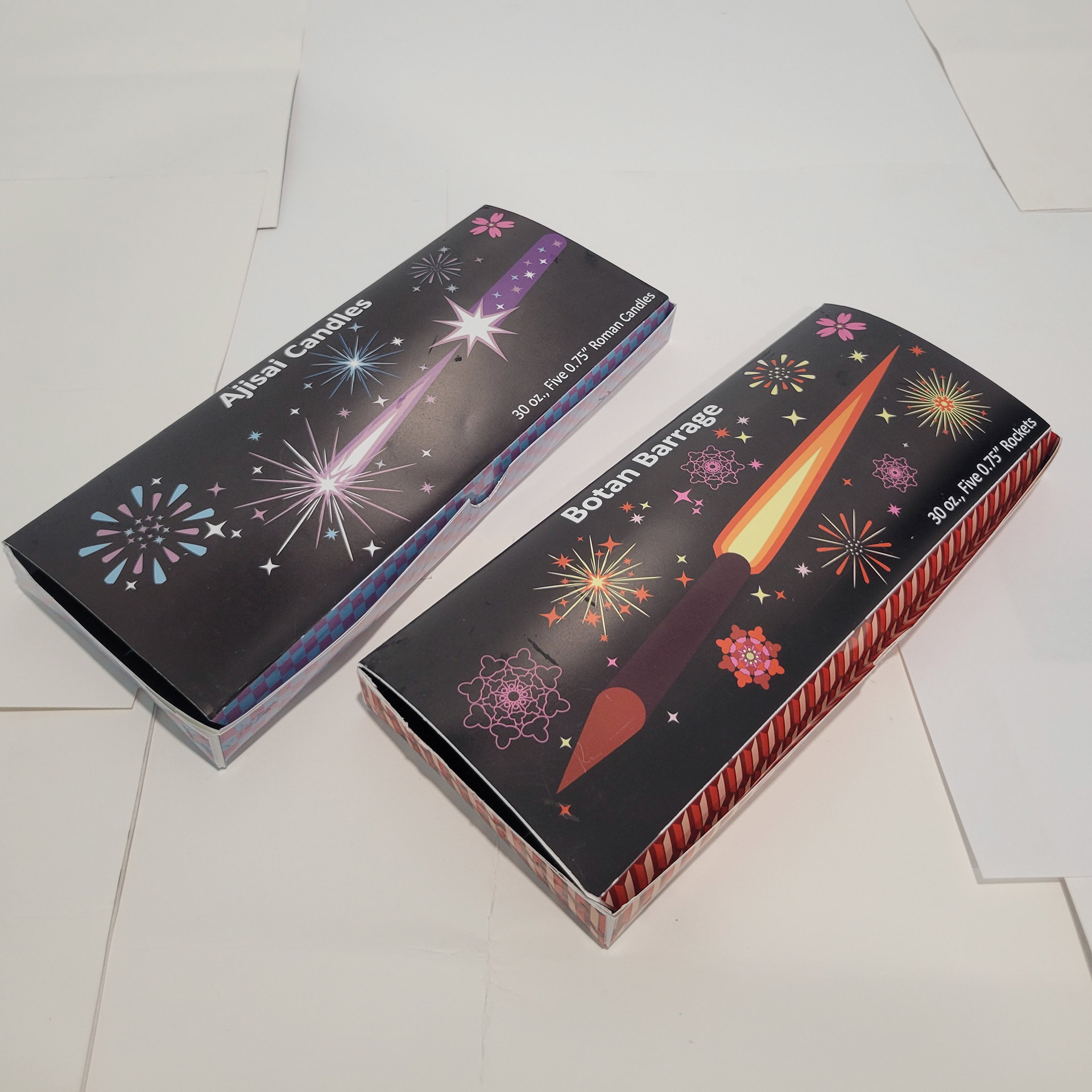 The boxes for Roman candles (themed after hydrangeas) and rockets (themed after peonies).