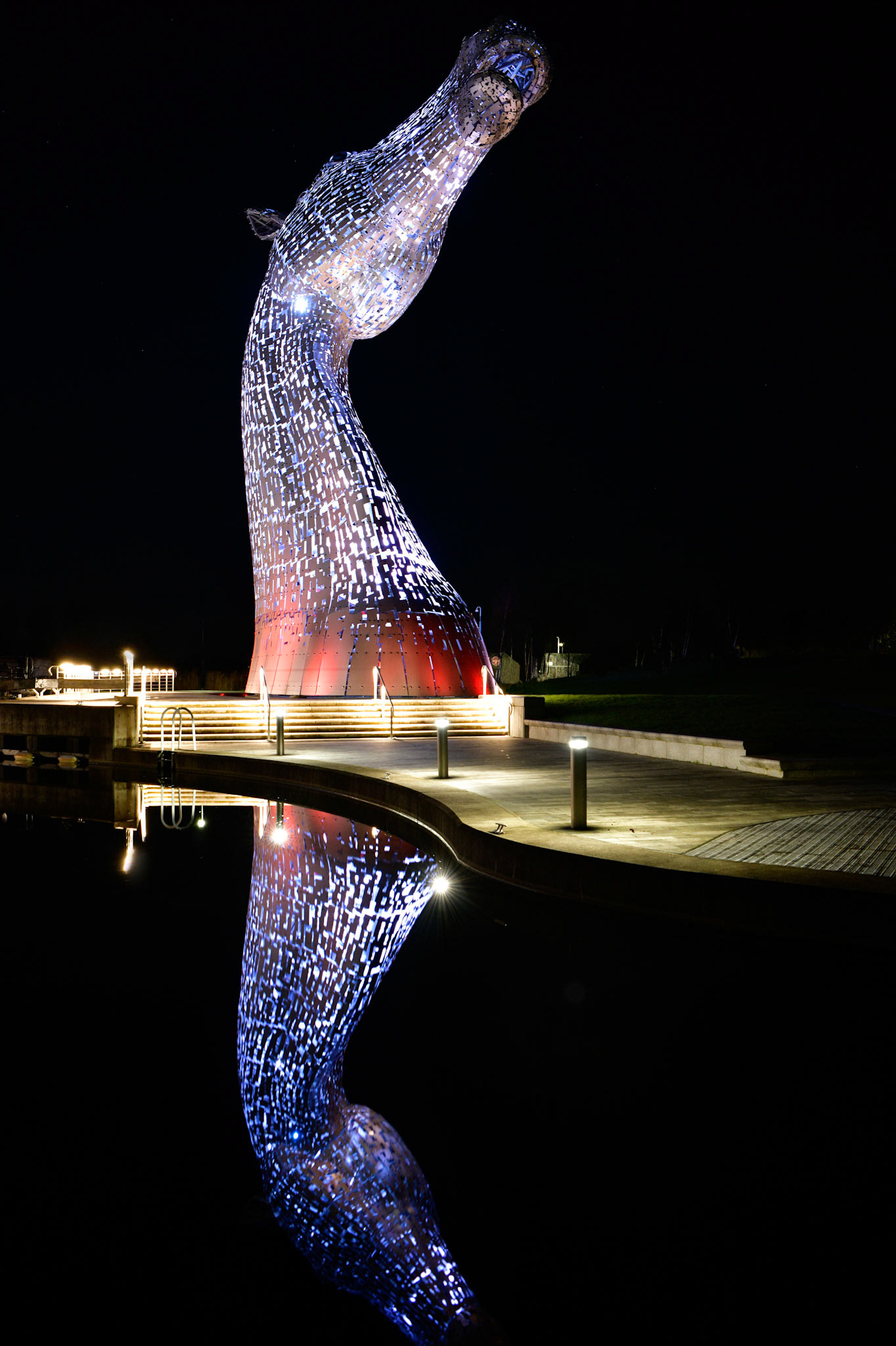 The Kelpies at night and reflection