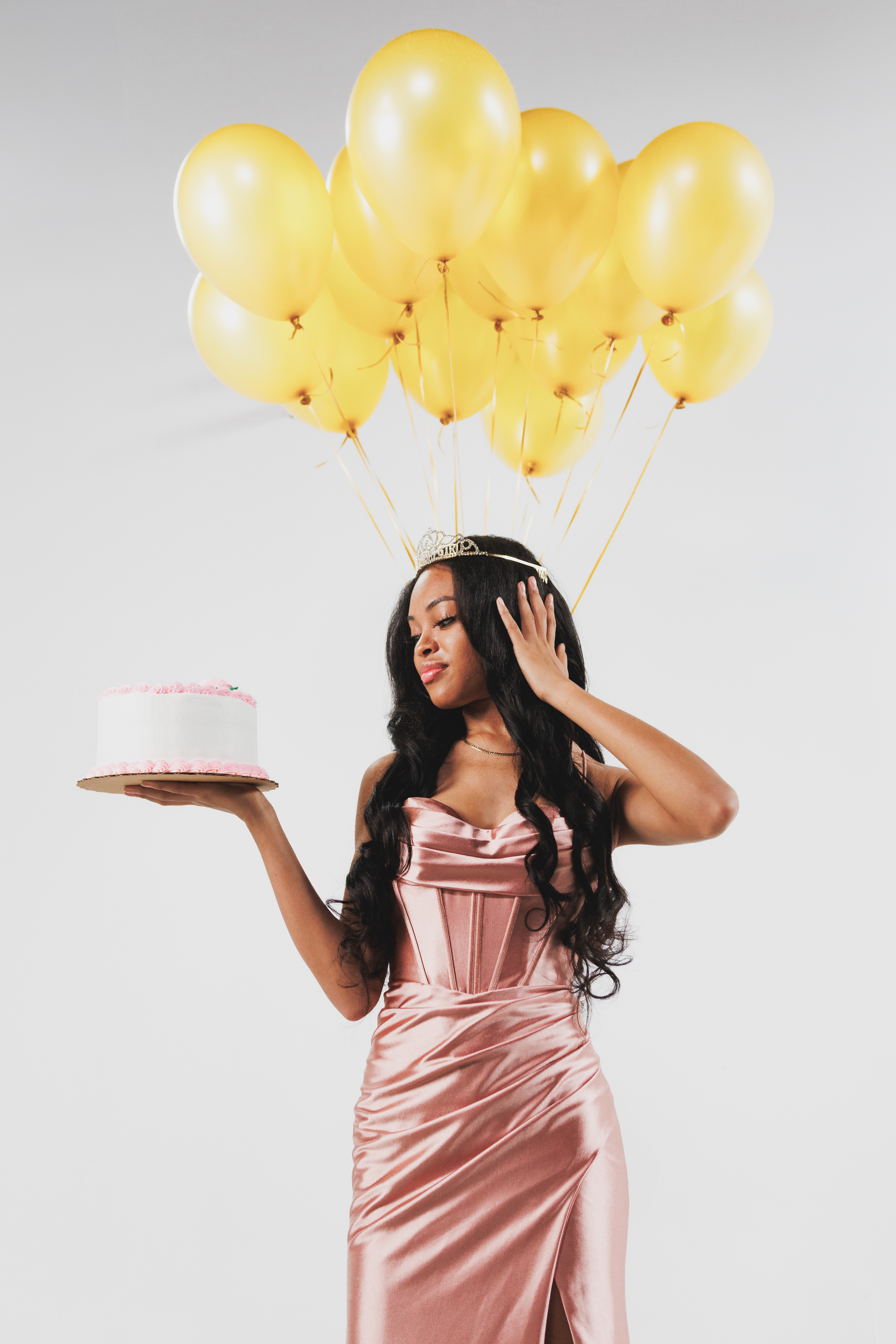 @mj.luvsodiff | Studio birthday photoshoot yellow balloons and a birthday cake in Jacksonville (Colab Cafe)