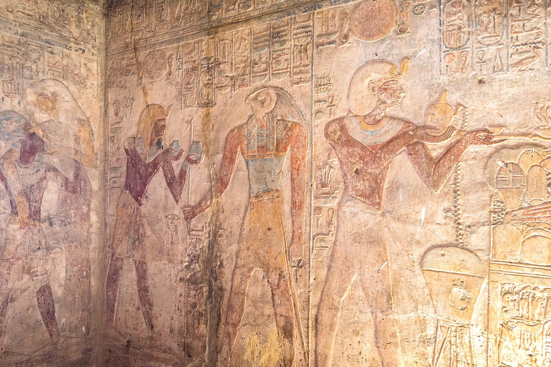 Ramsess II presenting jars of libation water to Horus