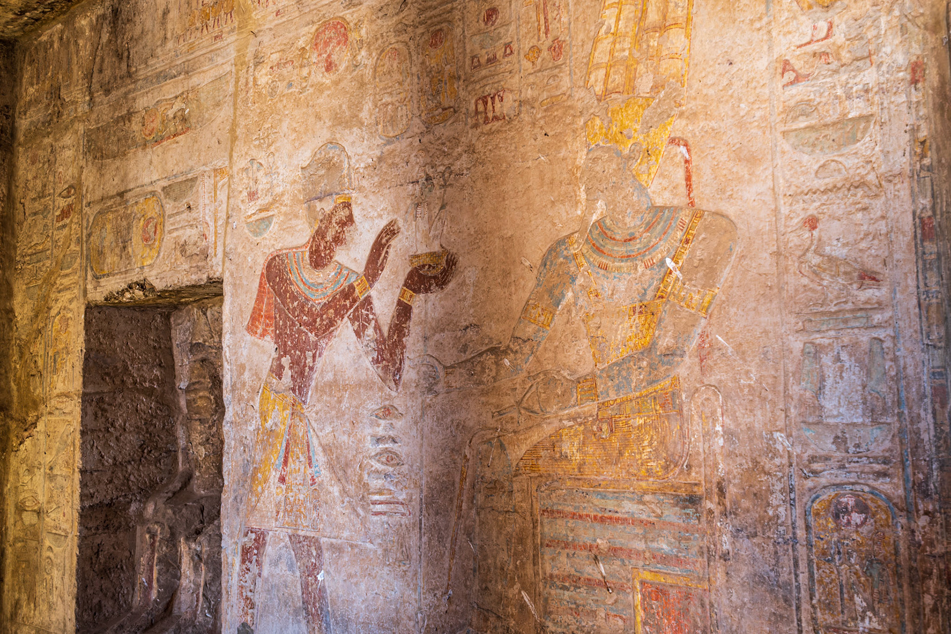 Ramsesses II makes an offeriong of the goddess Ma'at to the god Amun