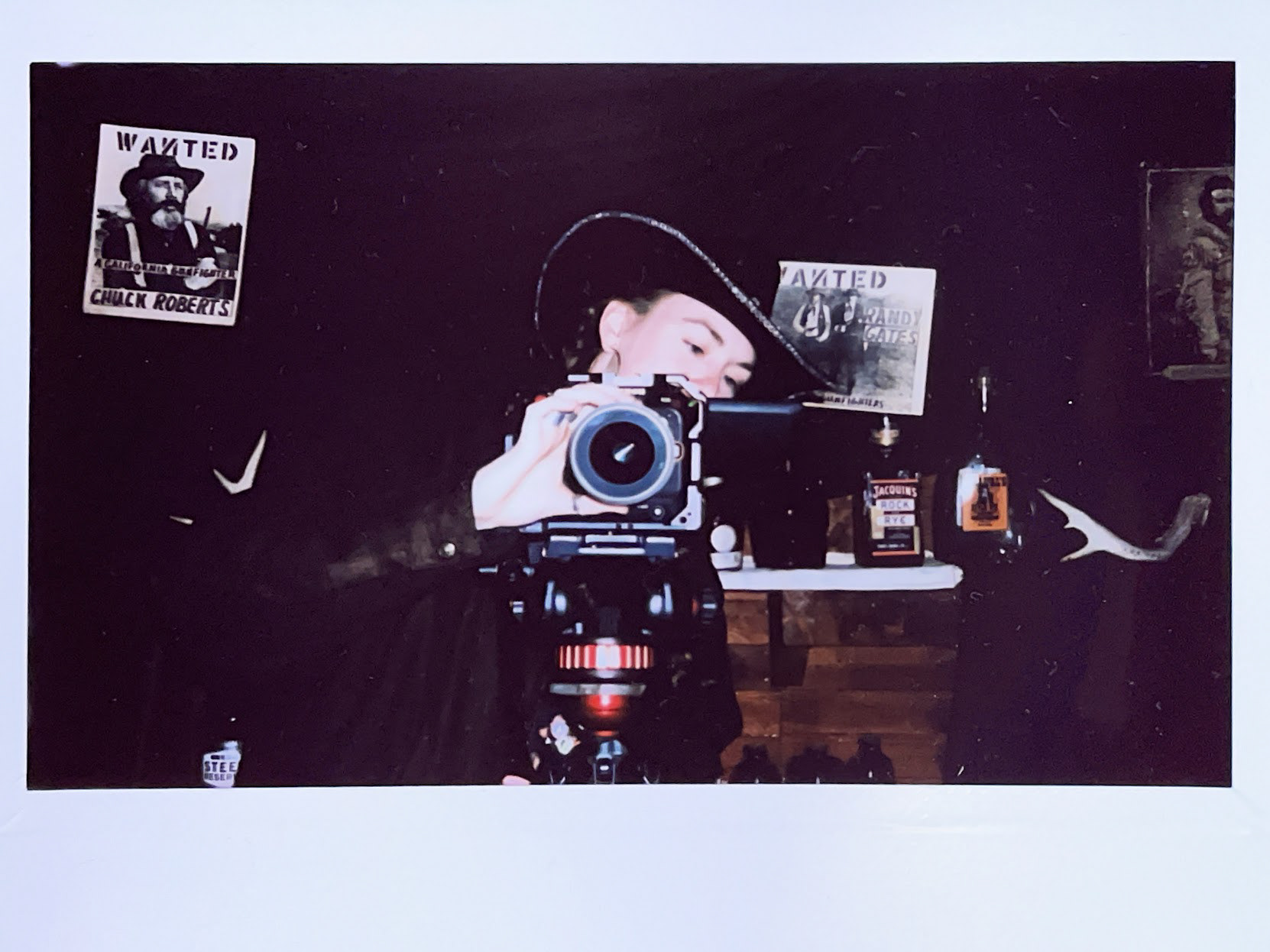 Kaitlyn setting up a camera Polaroid