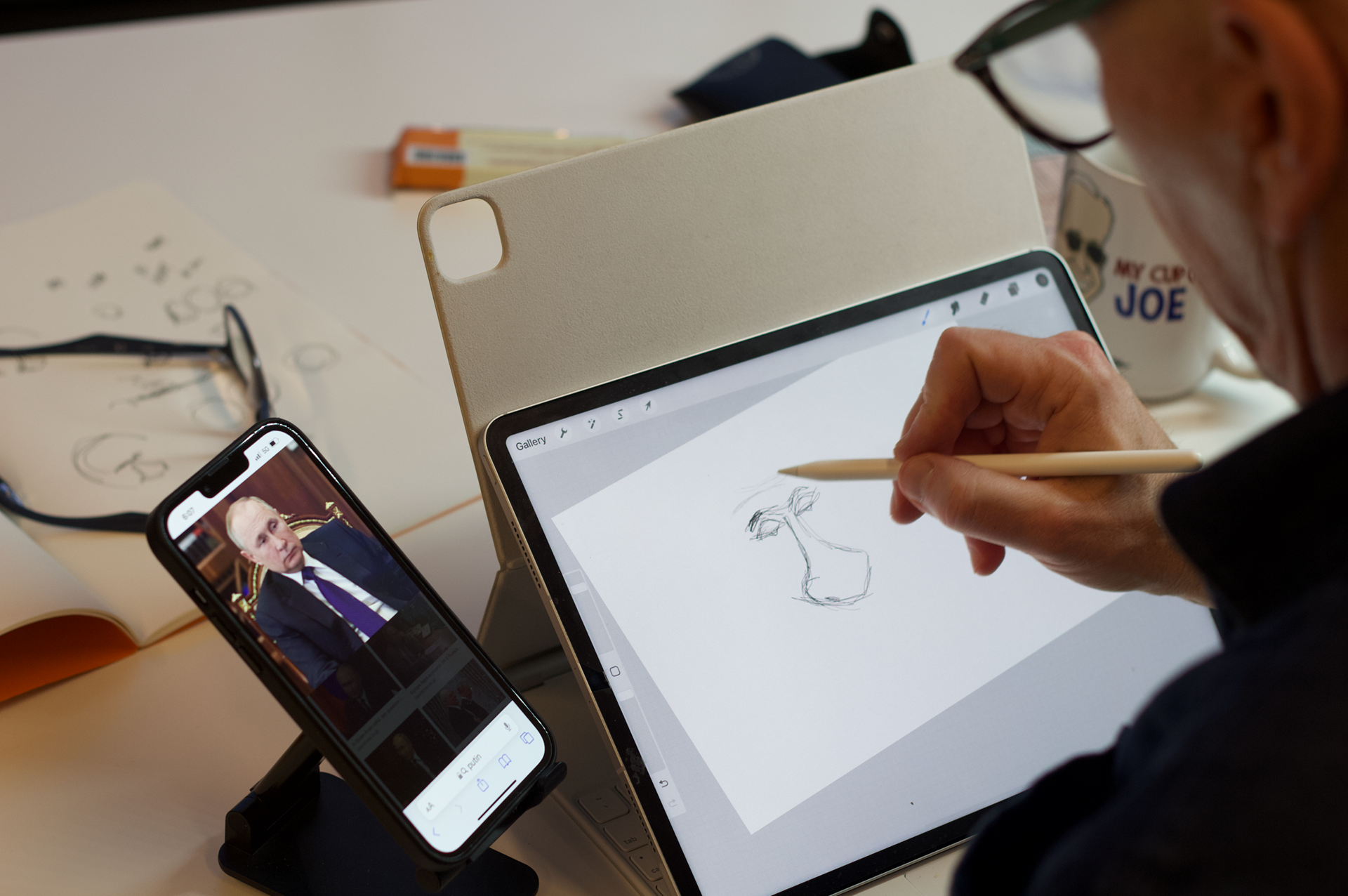 Koterba sketches Russian President Vladimir Putin on his iPad. He believes that the world needs journalists and satirists more than ever in a world that has “seemingly gone mad.” Koterba’s work is fact based and inspired by current political issues. “I get my ideas from not only reading the news, but by paying attention to what people are talking about and what they care about,” Koterba said.