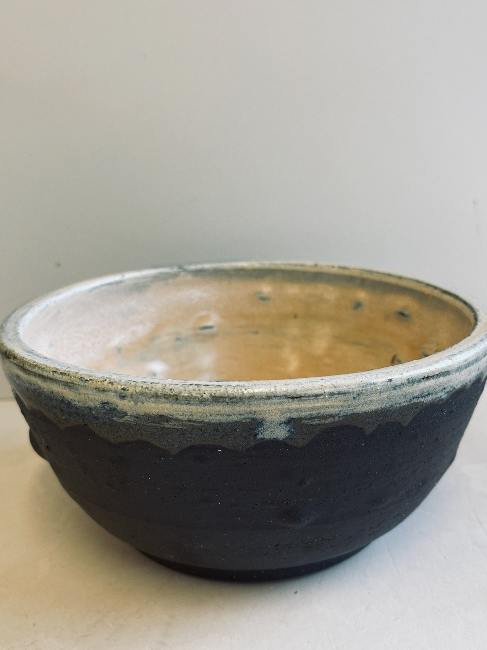 added white slip on the surface, BEFORE glaze