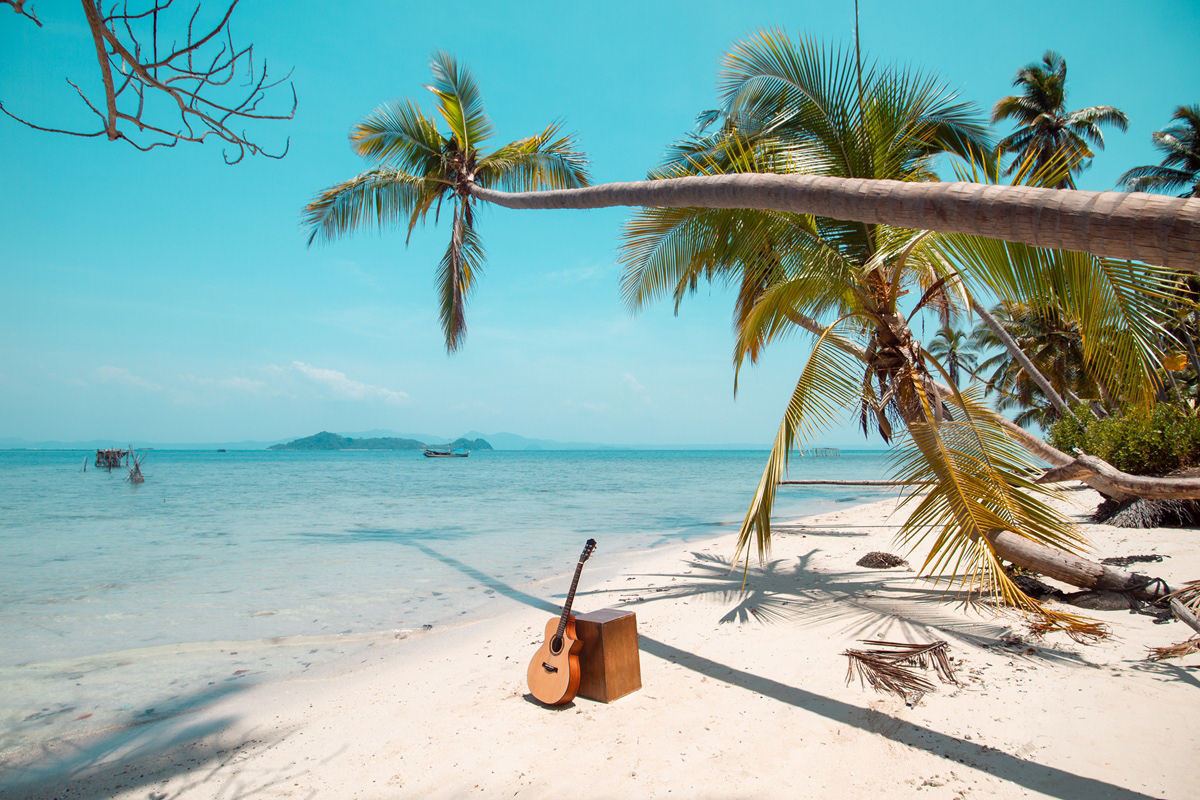 Guitar and cajon on beach