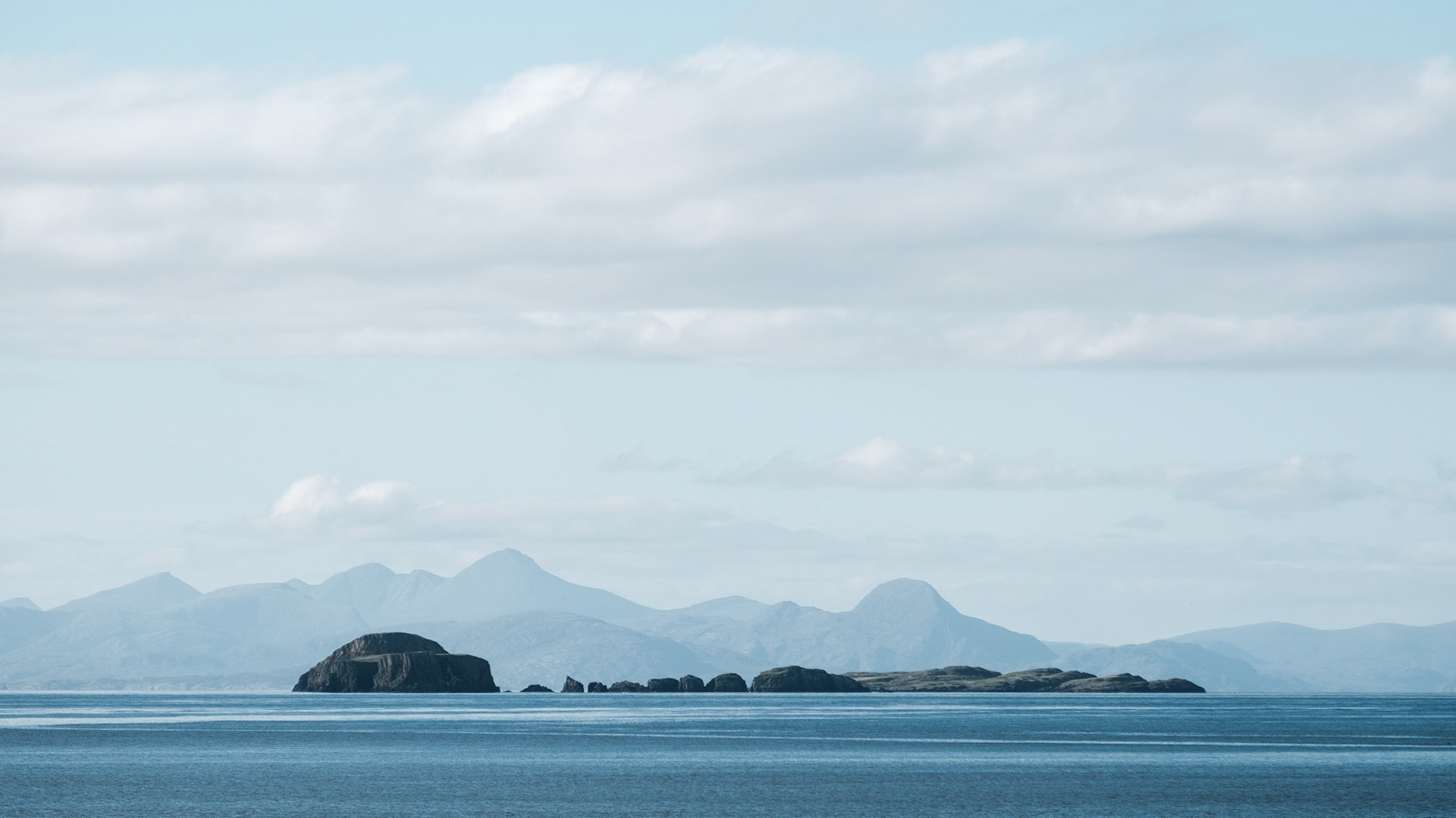 Gearran Island and Fladaigh Chùain in front of Harris