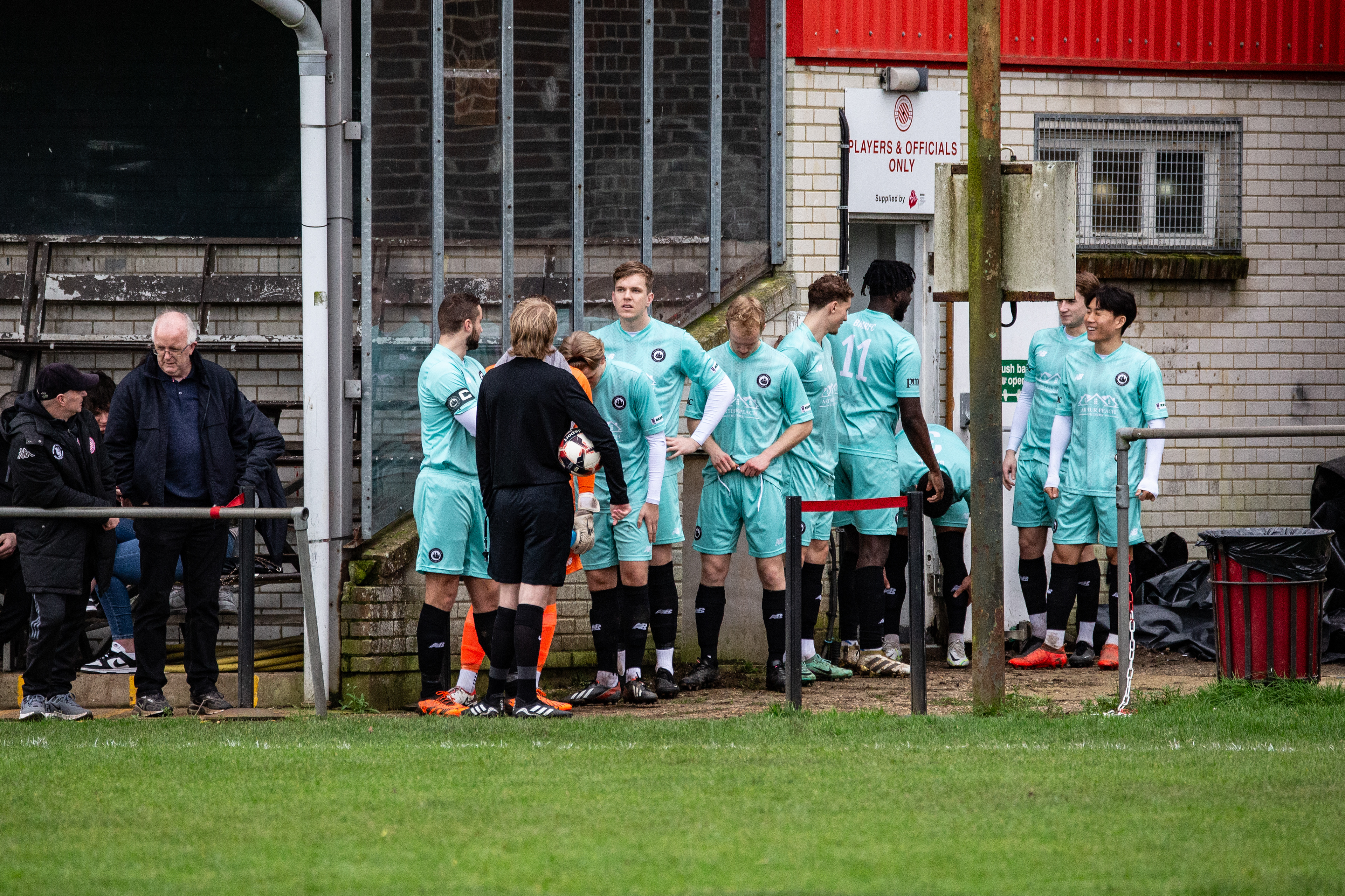 Christchurch FC players coming out at Victoria Park