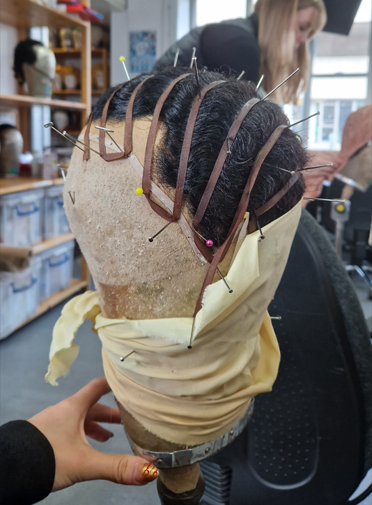 setting wig 1 for Giles Terera as Guy