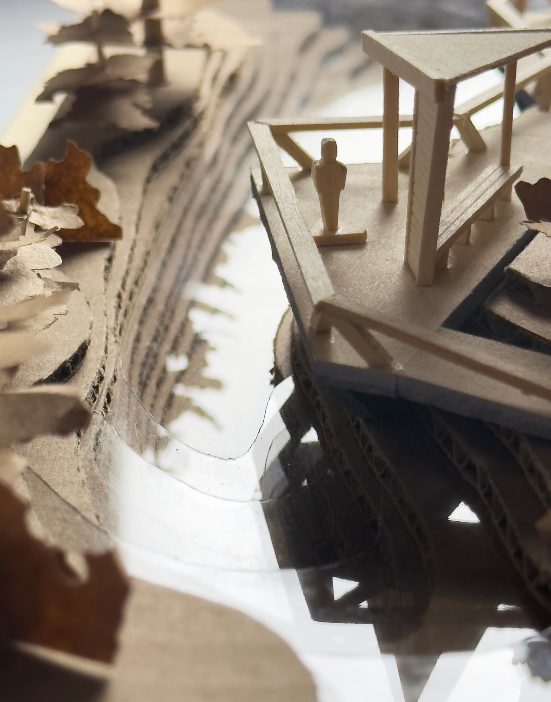 winding pavilion peaks over the river, immersing within the rapids