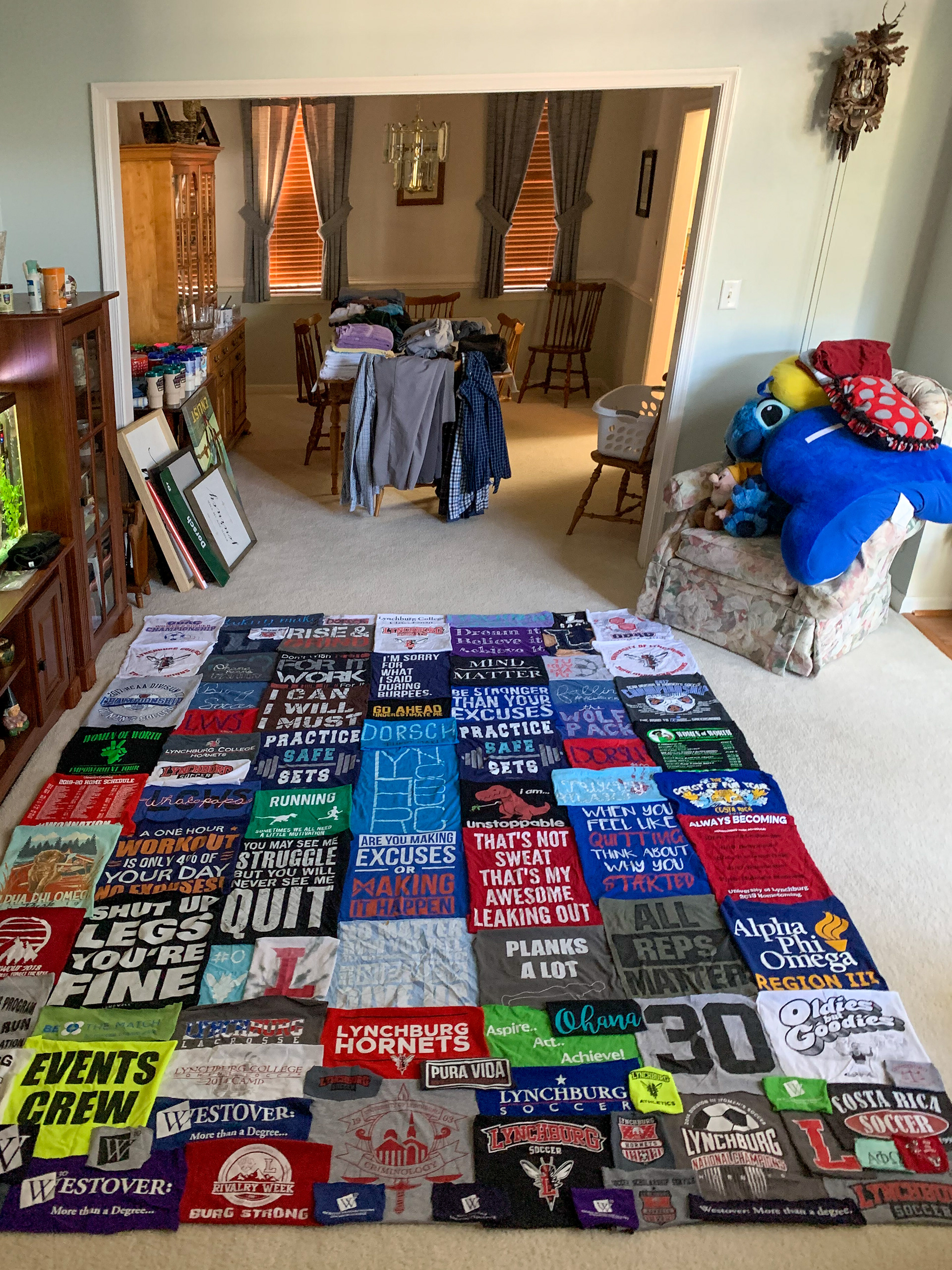 Caitlin Dorsch planning out how to start sewing her quilt of Lynchburg shirts, April, 28th, 2020. Caitlin Dorsch | Chesapeake, Virginia.
