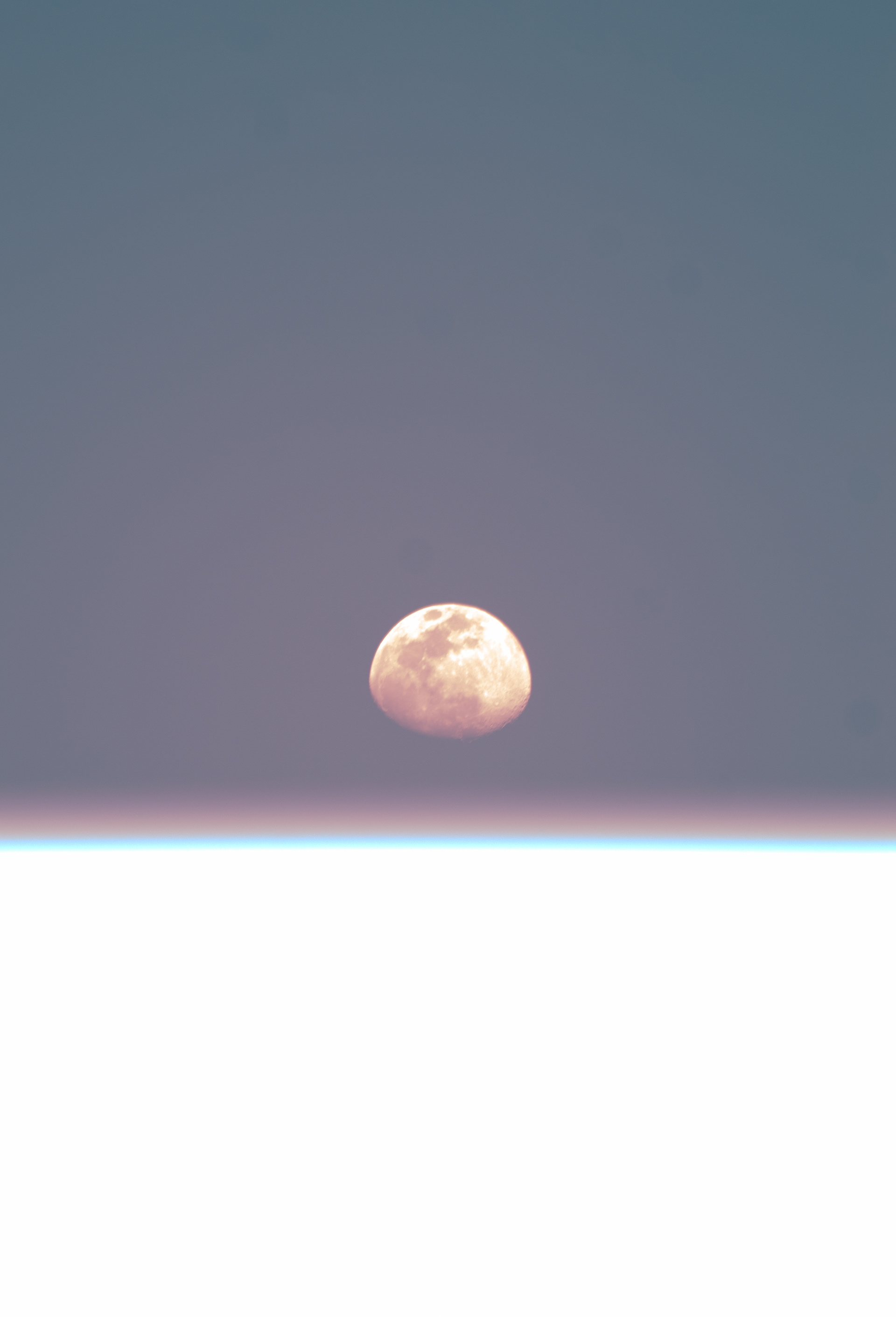 Moon, captured with a telephoto lens.