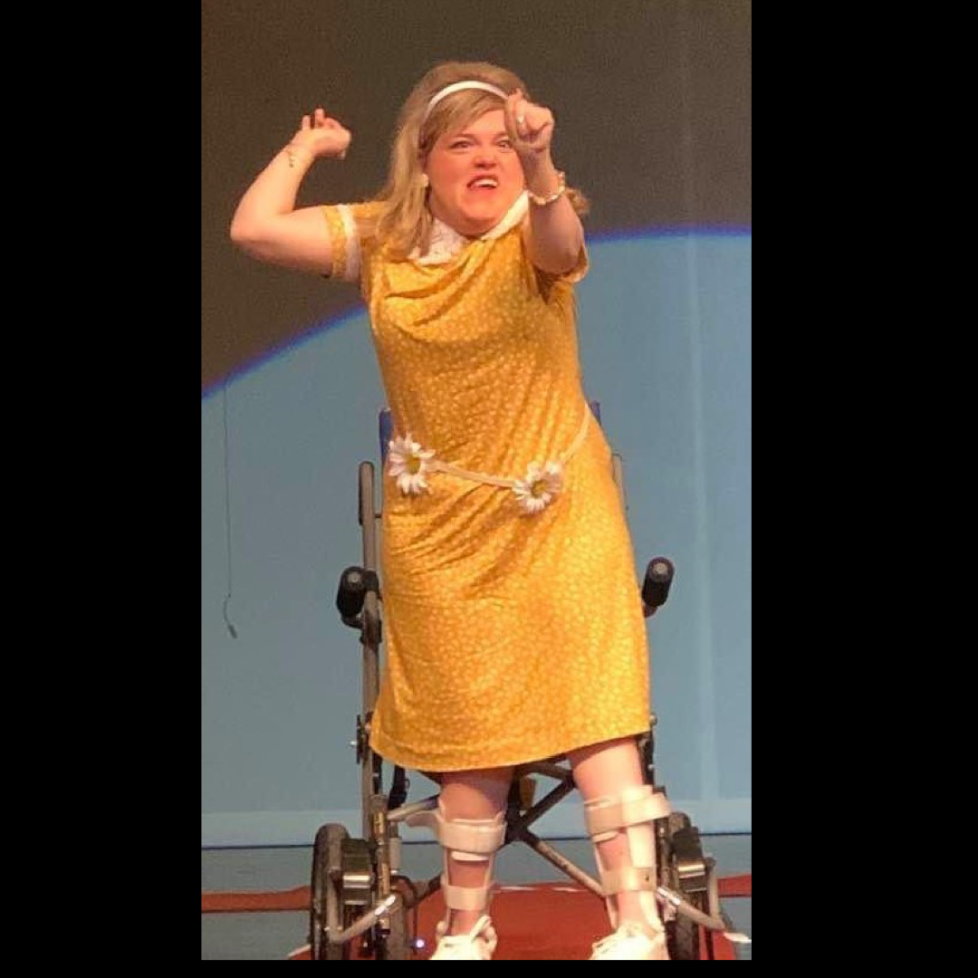 Marisa wore her Daisy Yellow A-Line Dress at the fashion show in April 2021