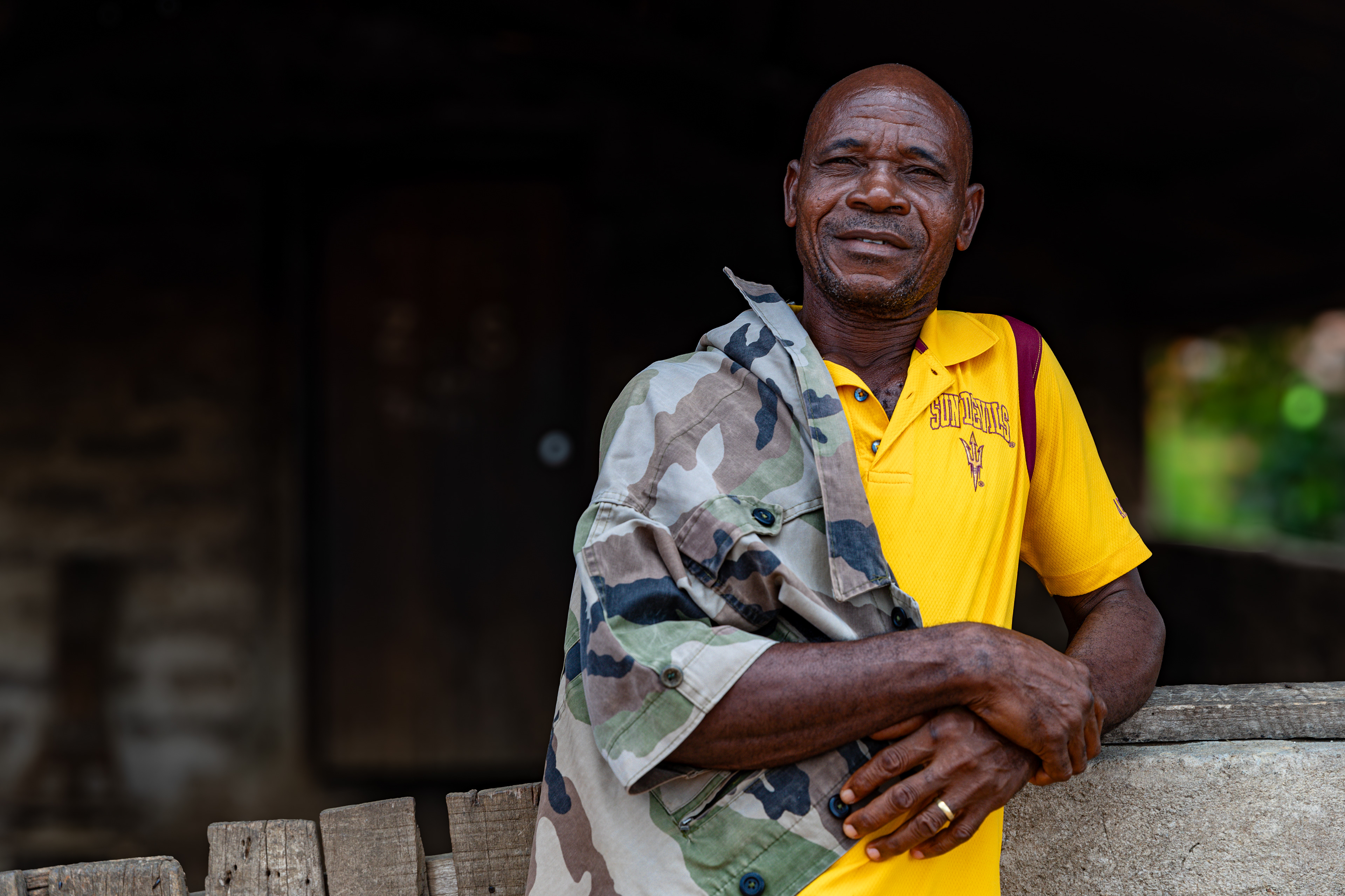 Portrait of Digbeu Zeze Sylvain, a DREAMS godfather in Zokoguhé village, 18 km from Daloa in western Côte d’Ivoire, photographed on June 29, 2024, by Miléquèm Diarassouba for USAID, highlighting his work to prevent gender-based violence and HIV in West Africa.