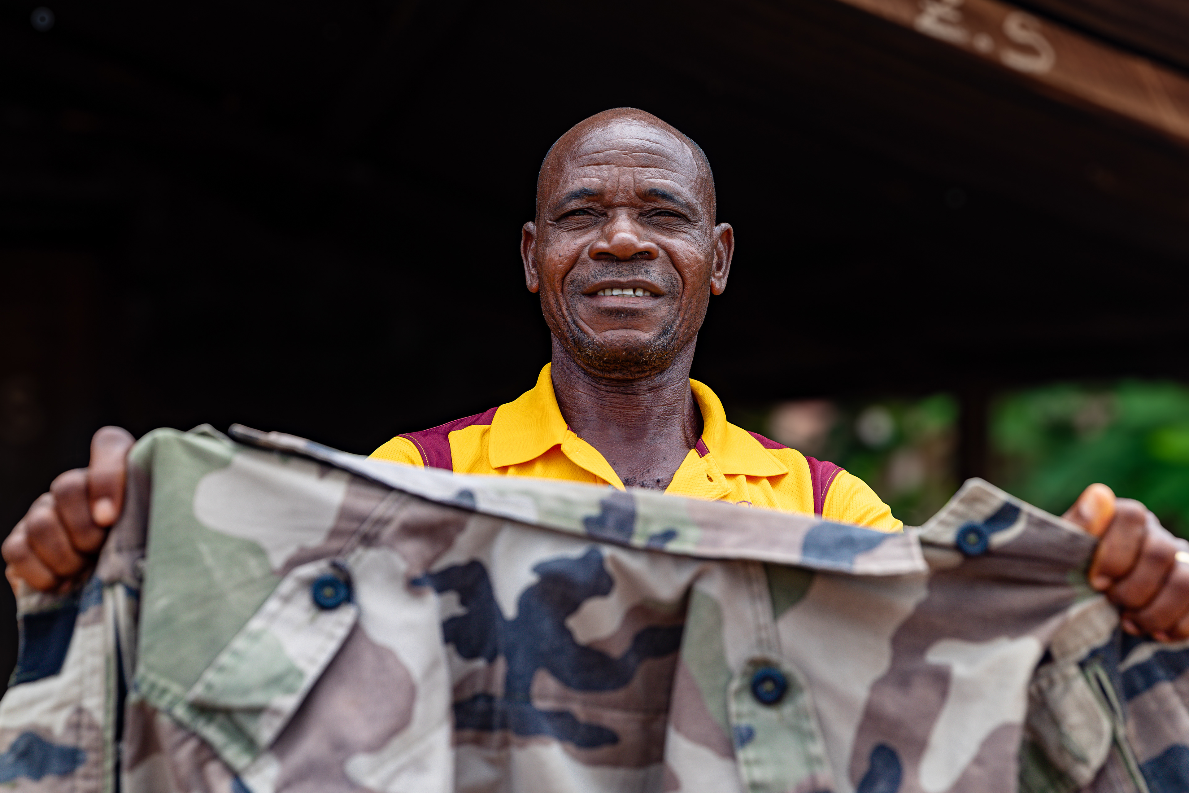 Portrait of Digbeu Zeze Sylvain, a DREAMS godfather in Zokoguhé village, 18 km from Daloa in western Côte d’Ivoire, photographed on June 29, 2024, by Miléquèm Diarassouba for USAID, highlighting his work to prevent gender-based violence and HIV in West Africa.