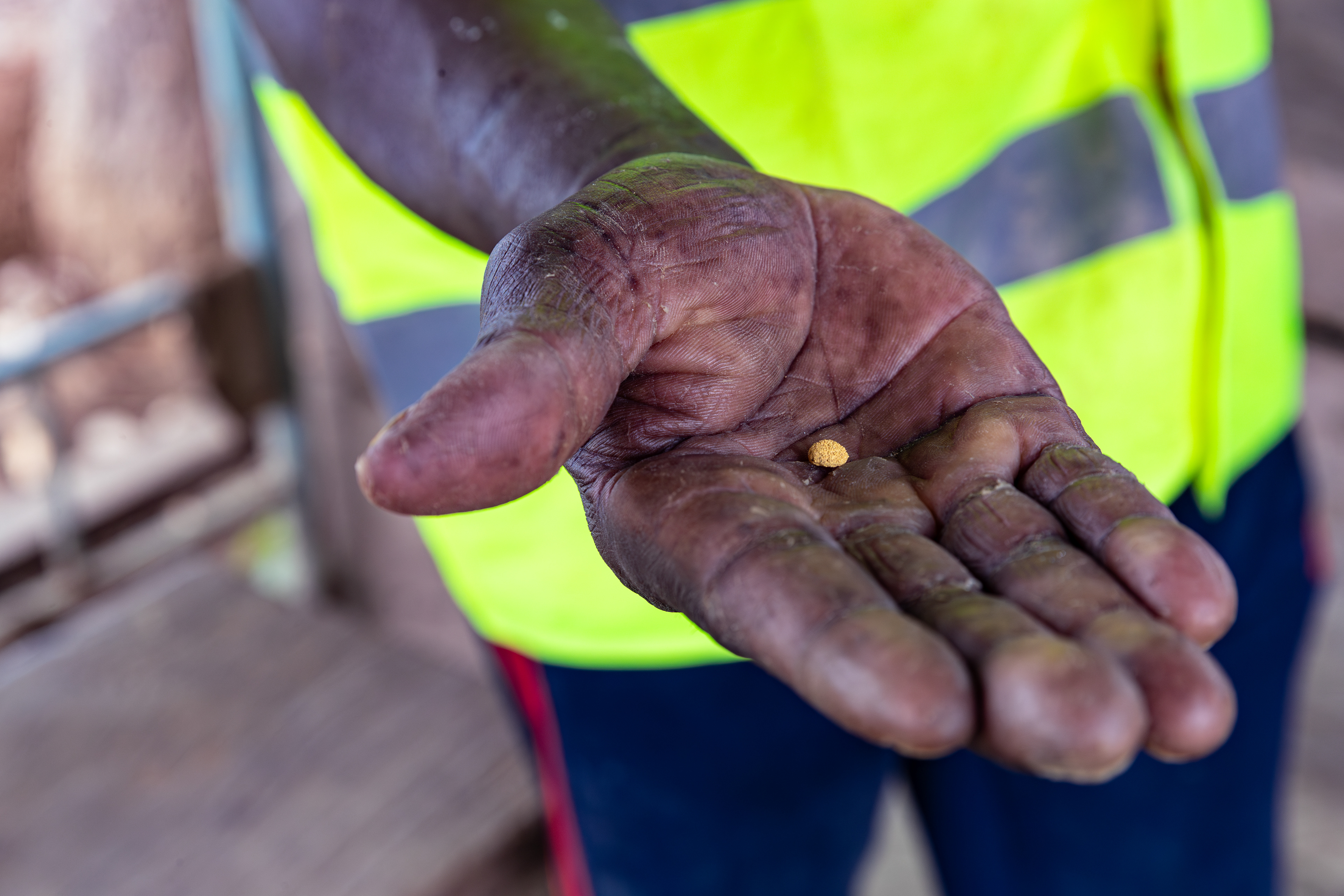 A small gold concentrate pellet recovered during the final stages of processing in Dabakala, Côte d’Ivoire.