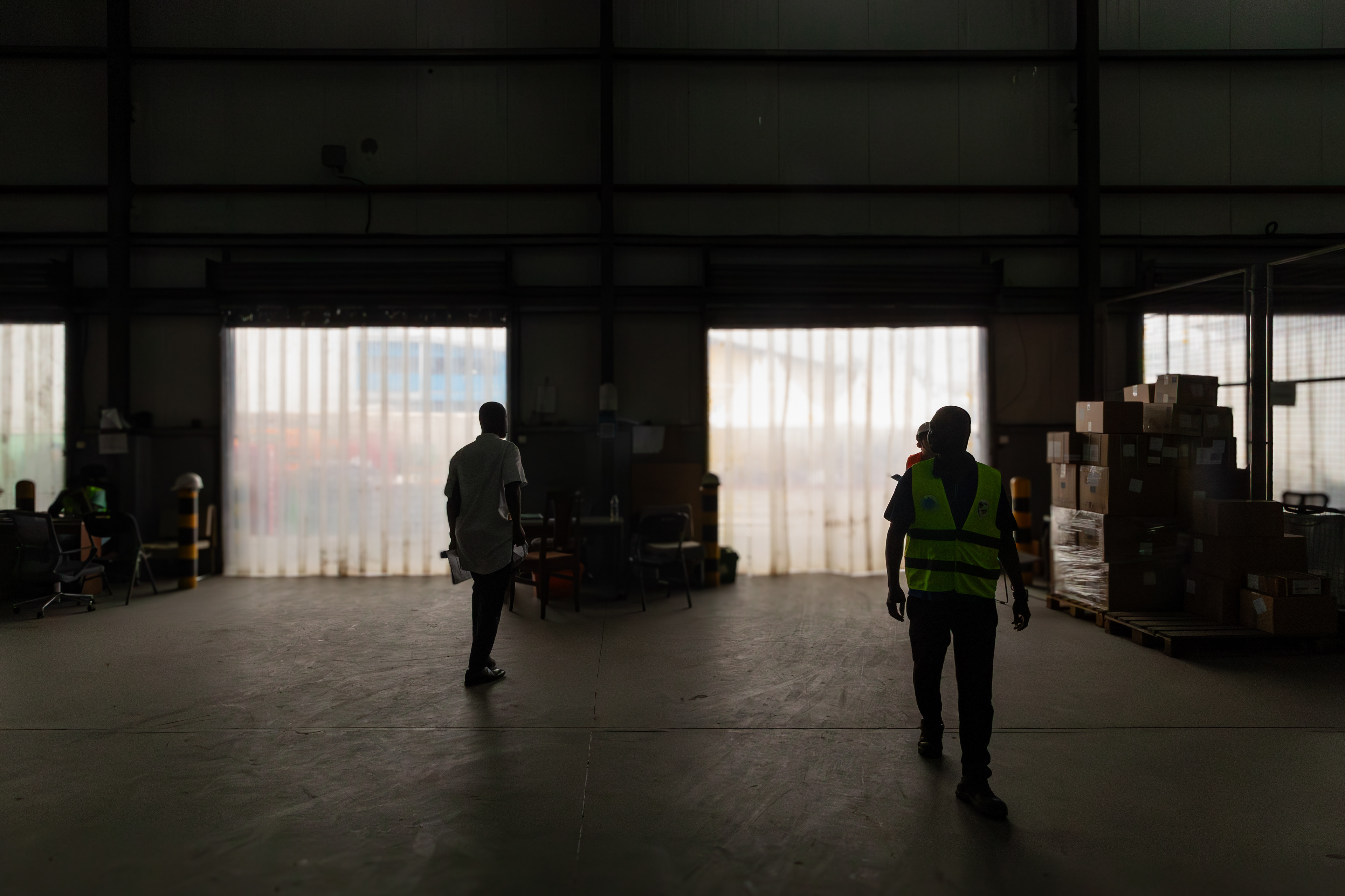 On 8 September 2025 in Abidjan, Ouattara Soualio, responsible for stock monitoring, and Diakité, a check collector, verify medicines at the central warehouse of the Nouvelle Pharmacie de la Santé Publique (NPSP). Their work ensures the accuracy of inventory and the quality control of essential health commodities before distribution to health facilities across Côte d’Ivoire.