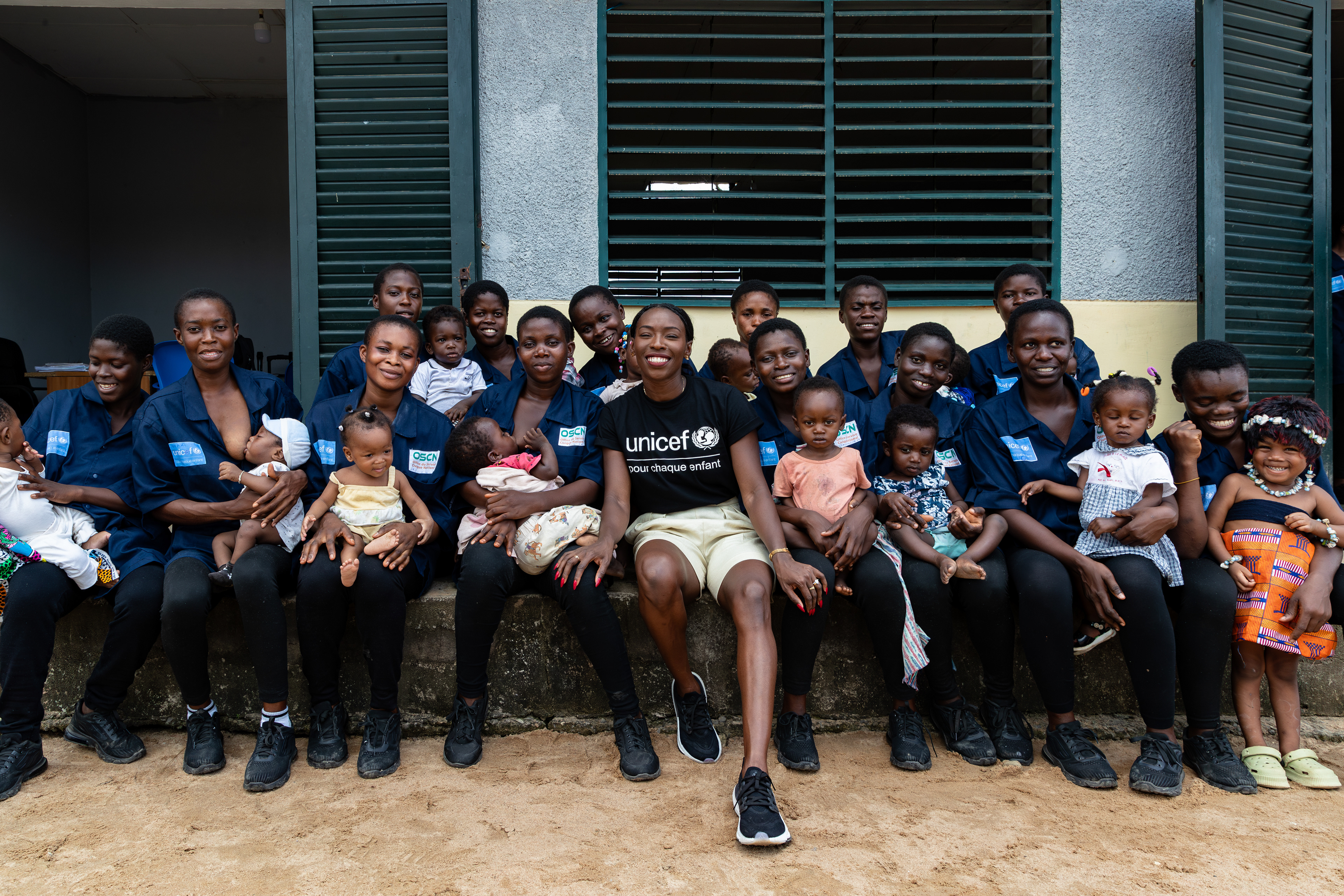 On 15th October 2024, at the Centre Civique d’Action pour le Développement in Guédikpo, South-West Côte d’Ivoire, UNICEF Ambassador Murielle Ahouré Demps poses with young mothers and their babies during her visit as part of the Girl Power project. Captured by Miléquêm Diarassouba, Photojournalist West Africa.