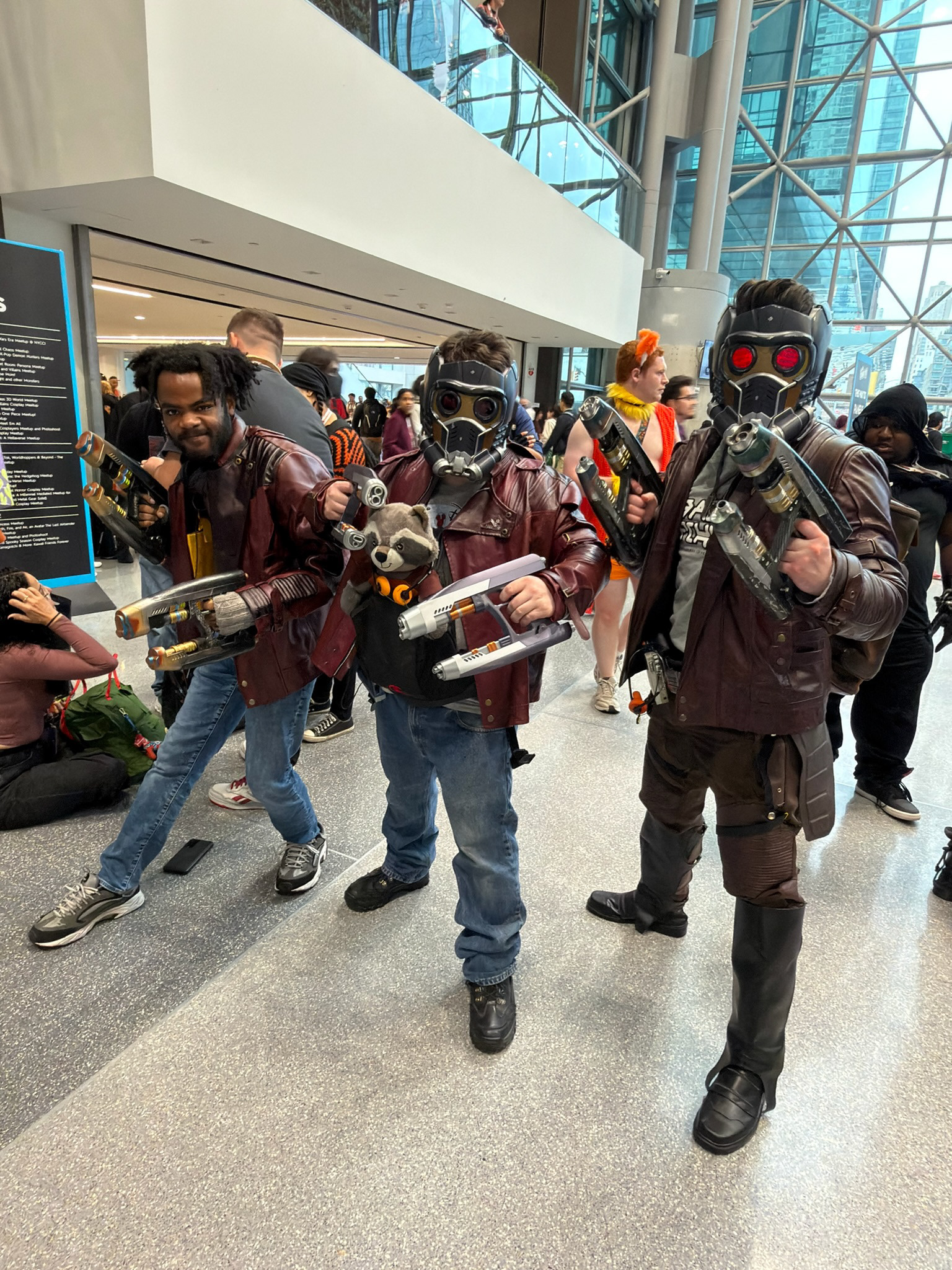 Blasters in use, 2025 New York Comic-Con, Star Lord Cosplay (Rightmost)