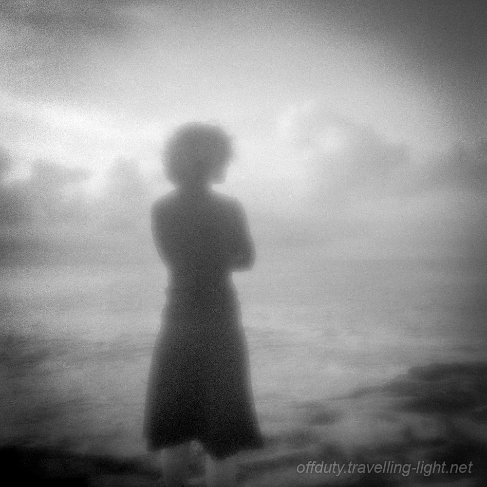 Young Woman on Cliff in Early Morning 2