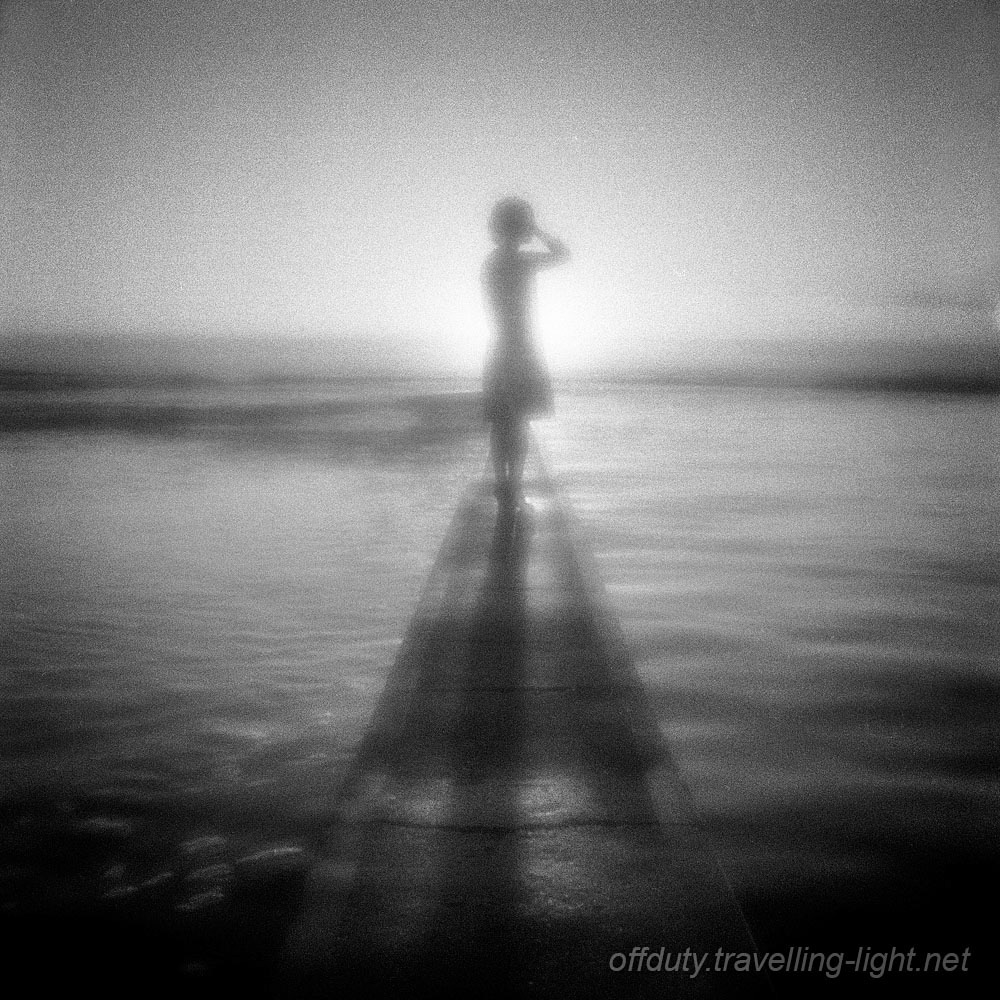 Young Woman by Pool at Sunrise