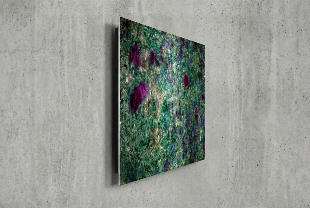 Side angle view of a frameless ChromaLuxe metal print on a concrete wall, showing the ultra-slim profile and modern aesthetic of the Signature Edition.