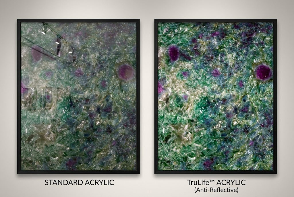 Side-by-side comparison of Standard Acrylic versus TruLife Anti-Reflective Acrylic on a framed Emerald Nebula print, demonstrating the superior clarity, reduced glare, and color vibrancy of the museum-grade TruLife option.