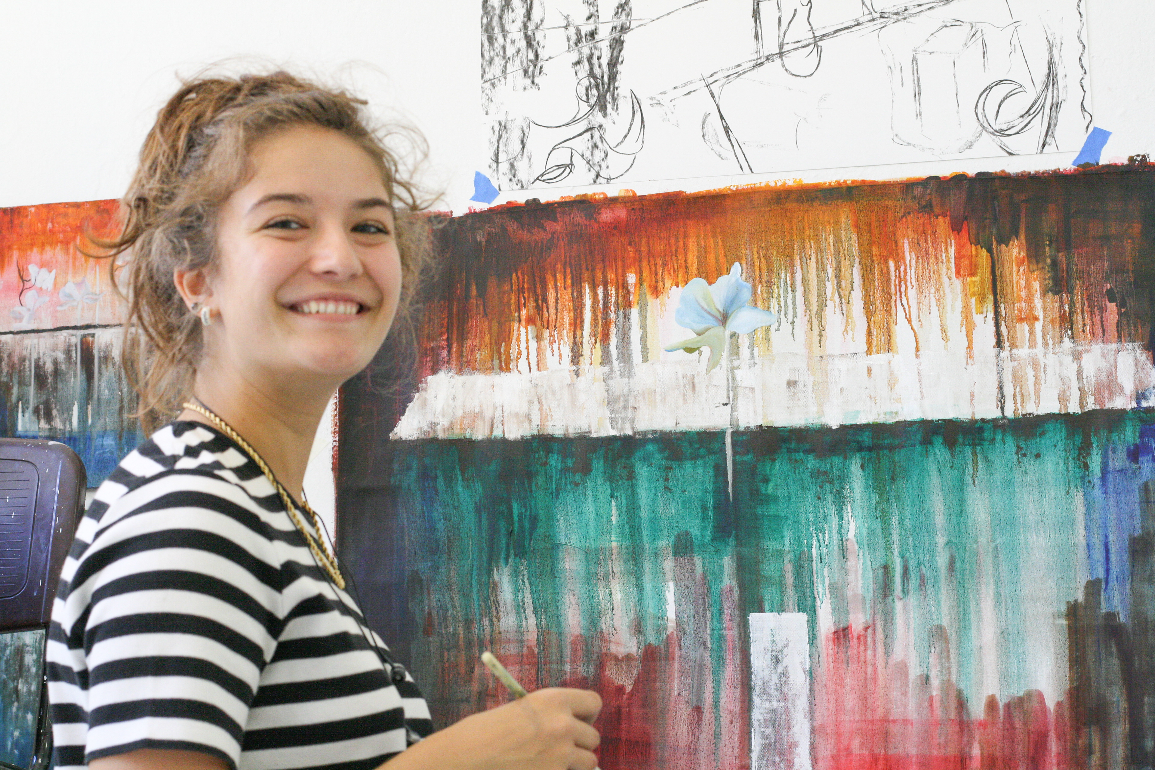 Abby midway through her painting