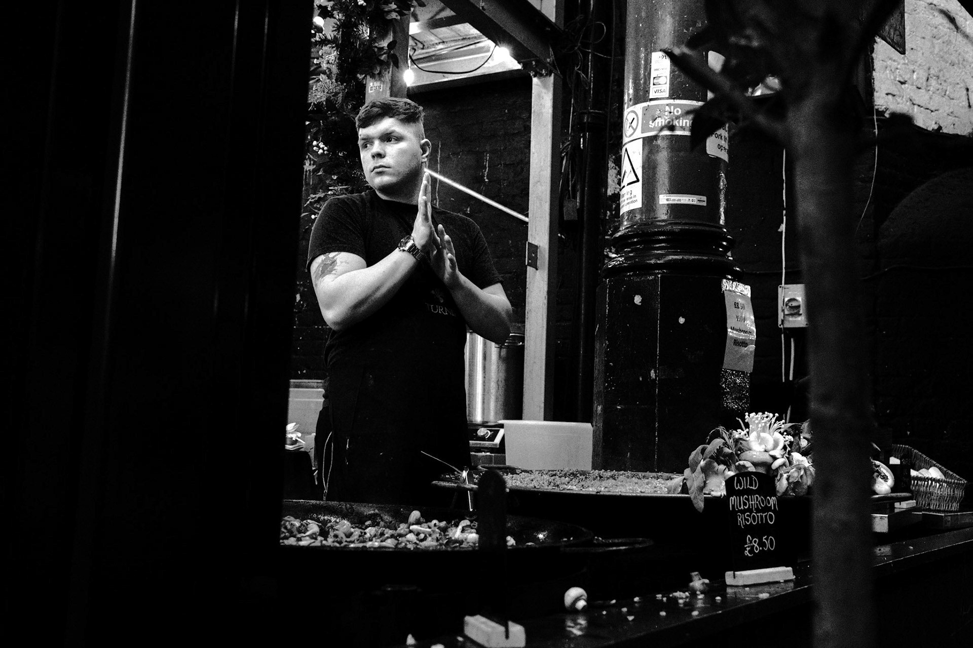 "Food stall seller at Borough Market, London 20220315 X100V 1/250 f/4.0 ISO 1600