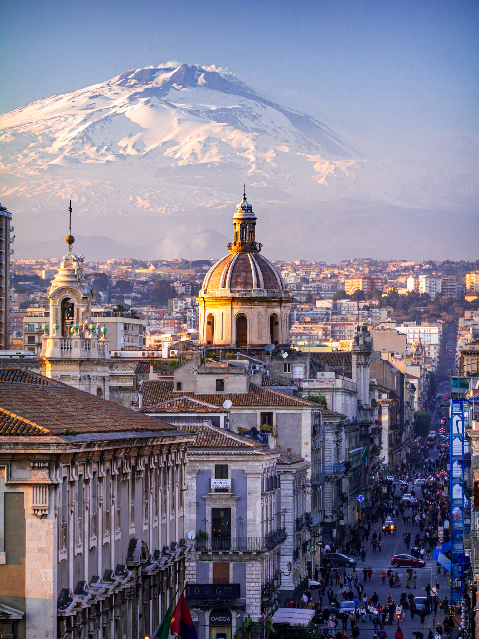 From the terrace of the Diocesan Museum, Catania unfolds in layers of stone and story—its domes and streets alive beneath the silent majesty of Mount Etna.