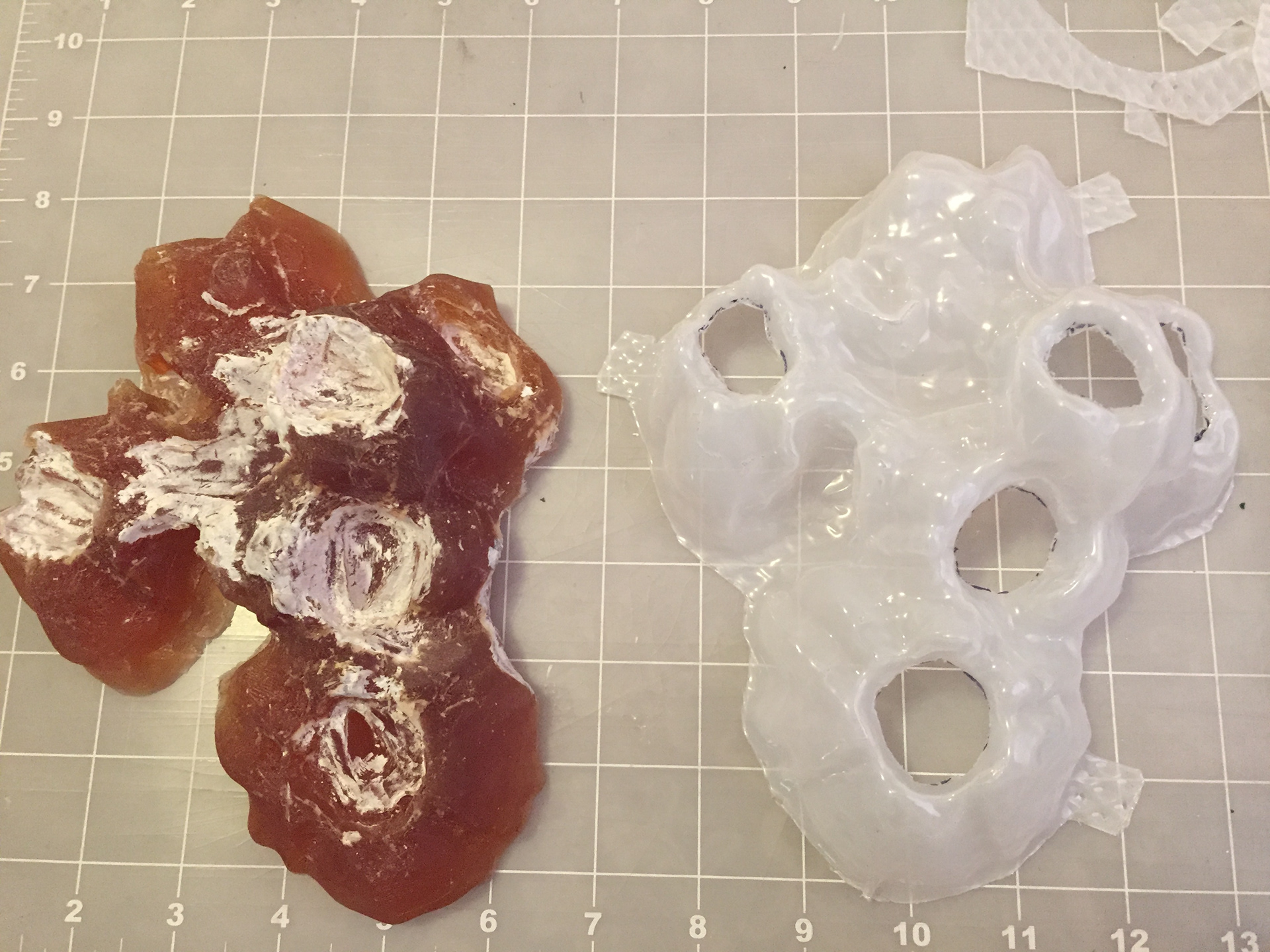 First prototype for a barnacle like structure to encourage otters natural foraging for feeding. Materials included are: rubber mold created with a 3D print, and a vacuum form to create a protective shell over the rubber.