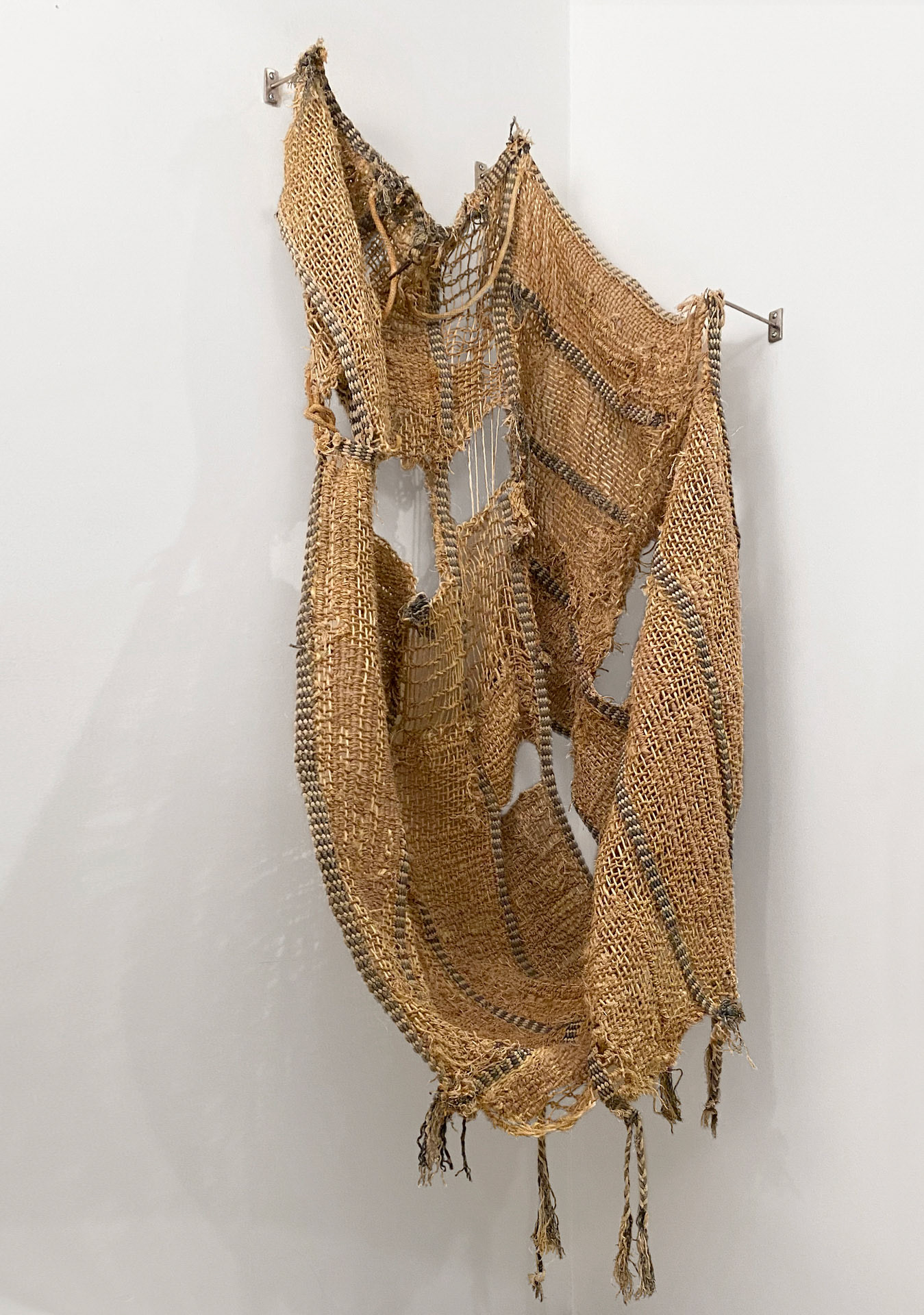 Cotton and sisal woven on repurposed rope horse fly nets. NFS.