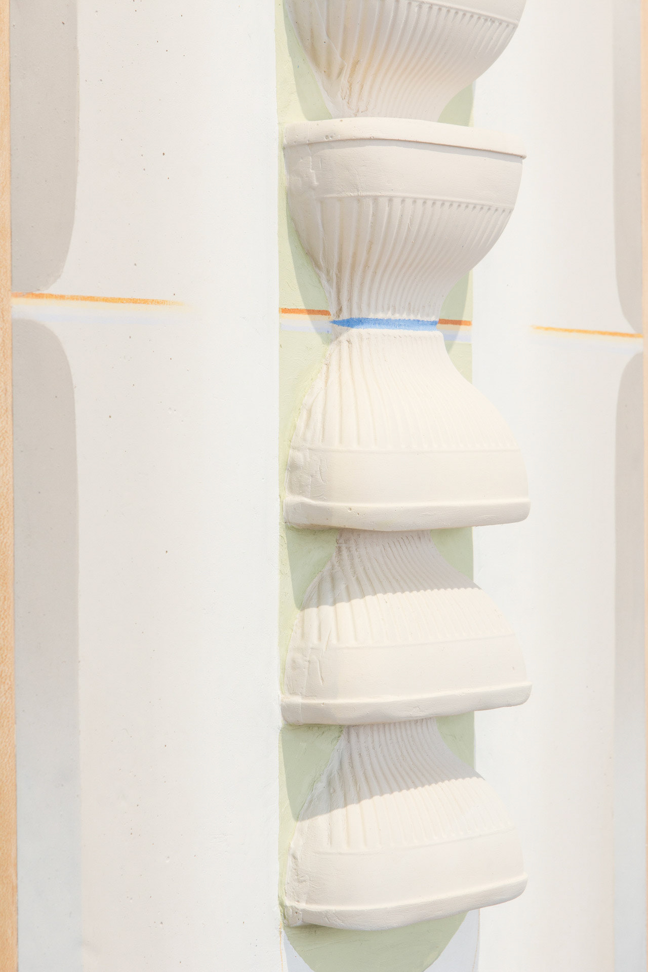 Created by pouring plaster into single-use plastics, then composing the works inside the frame and pouring more plaster around the forms. Oil and colored pencil used on top of the plaster and finished with a matte varnish.