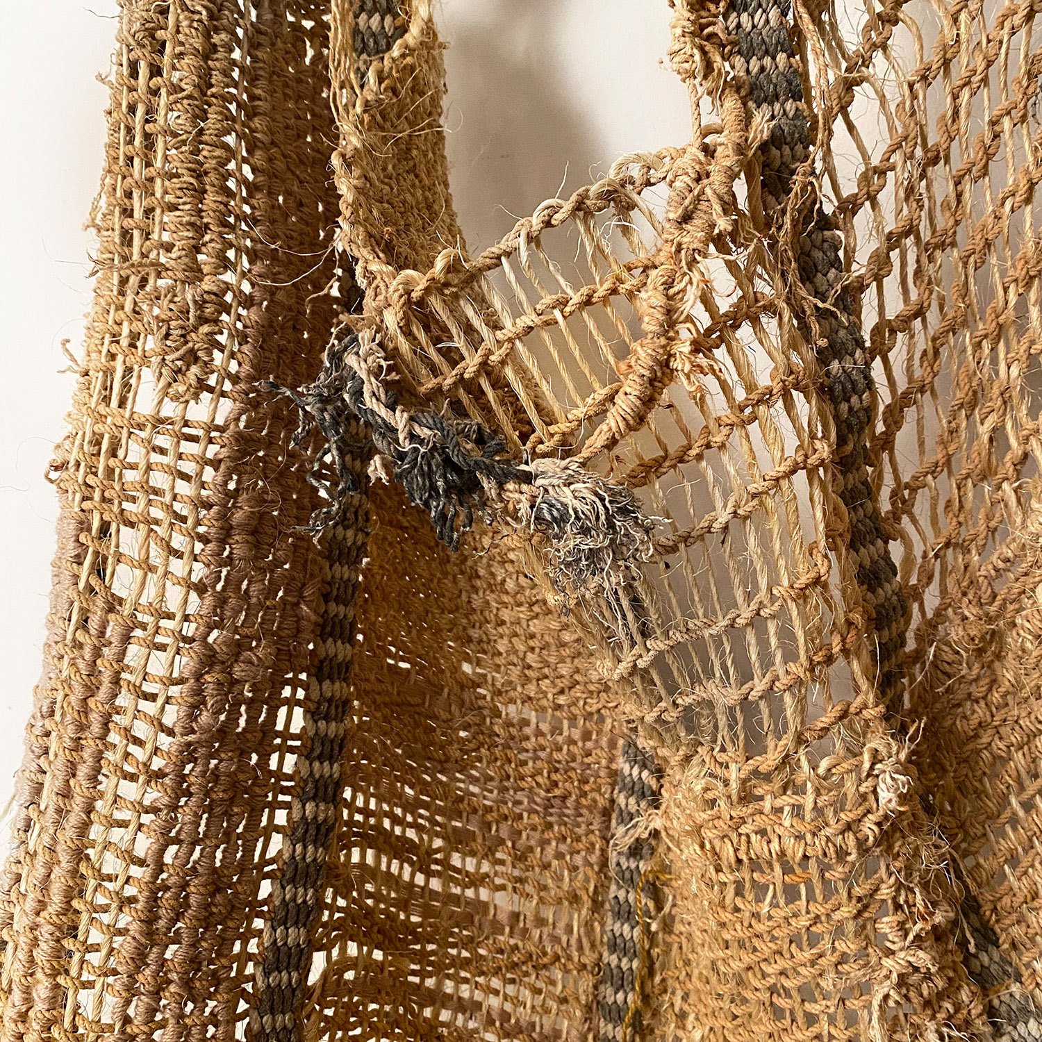 Cotton and sisal woven on repurposed rope horse fly nets. NFS.