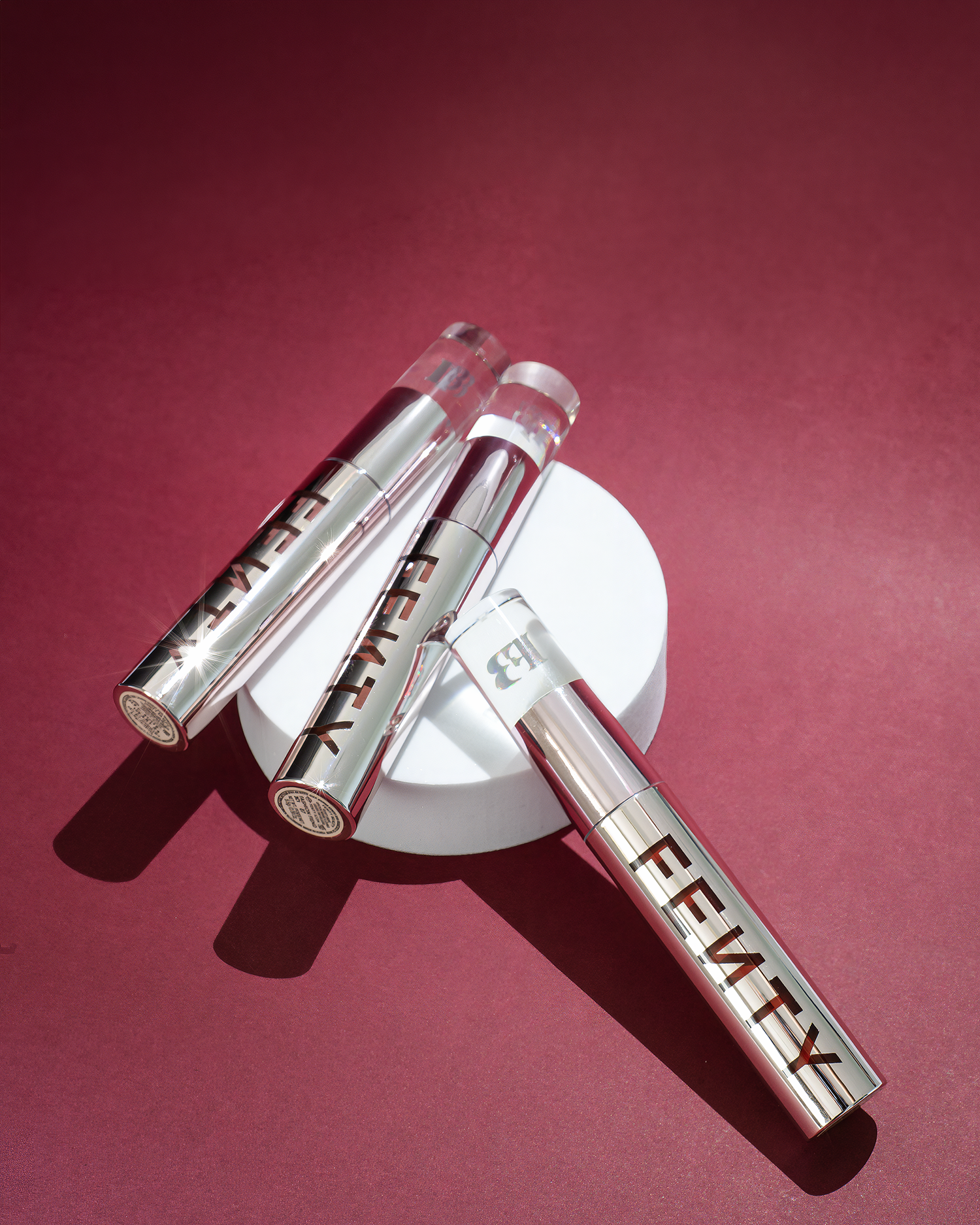 Glossy lip product flat lay