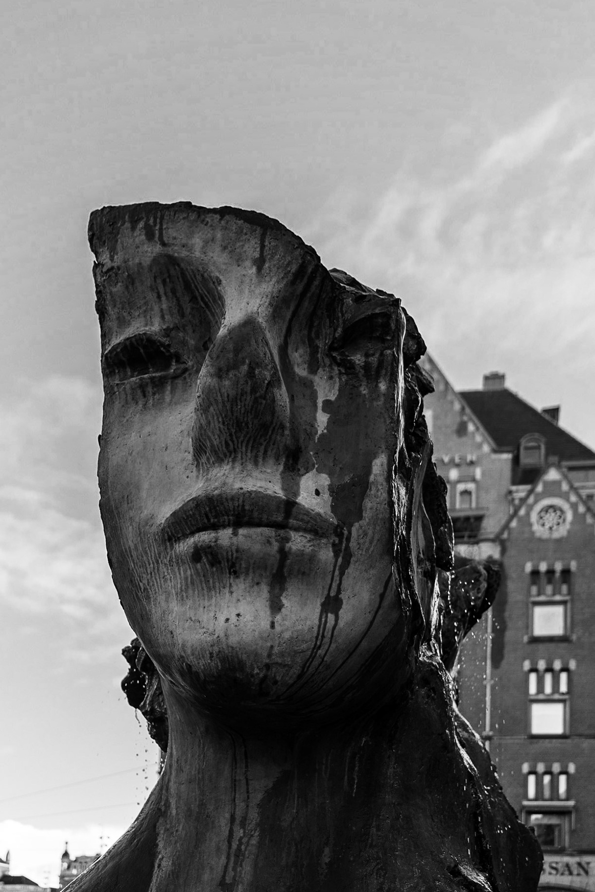 Cara de mujer statue close to Dam square in Amsterdam. Shot on a cold January morning.