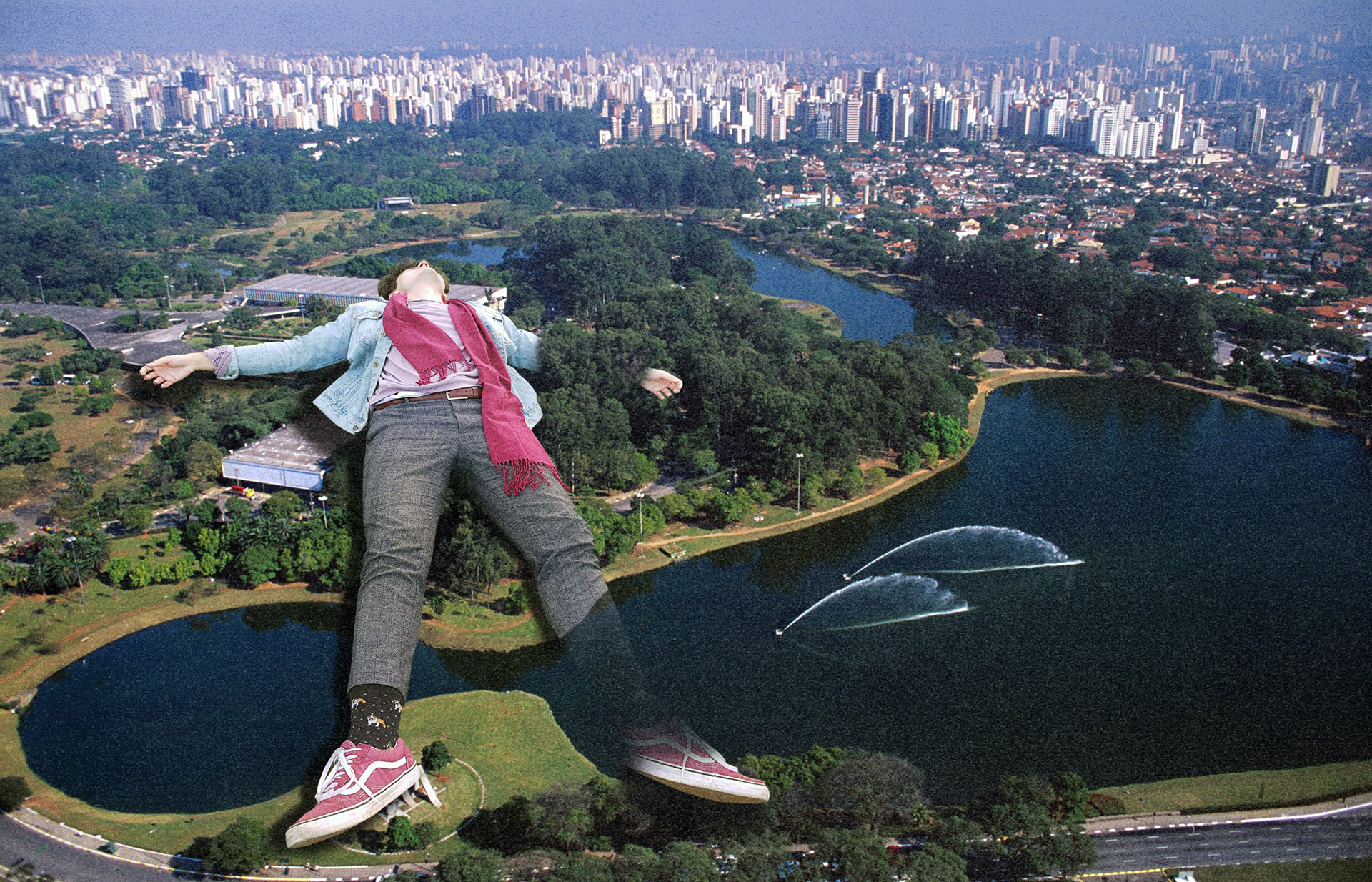 Artwork by Julian Konopelski. This is one of my favourite collages. In the background we can see the Ibirapuera Park in the center of Sao Paulo. I edited myself in, totally out of proportion. This giant, supposedly sleeping figure is a tribute to one of the most important books of my life, Macunaima, hence the title of the work "Descadescansando".. Ai, que preguiça!