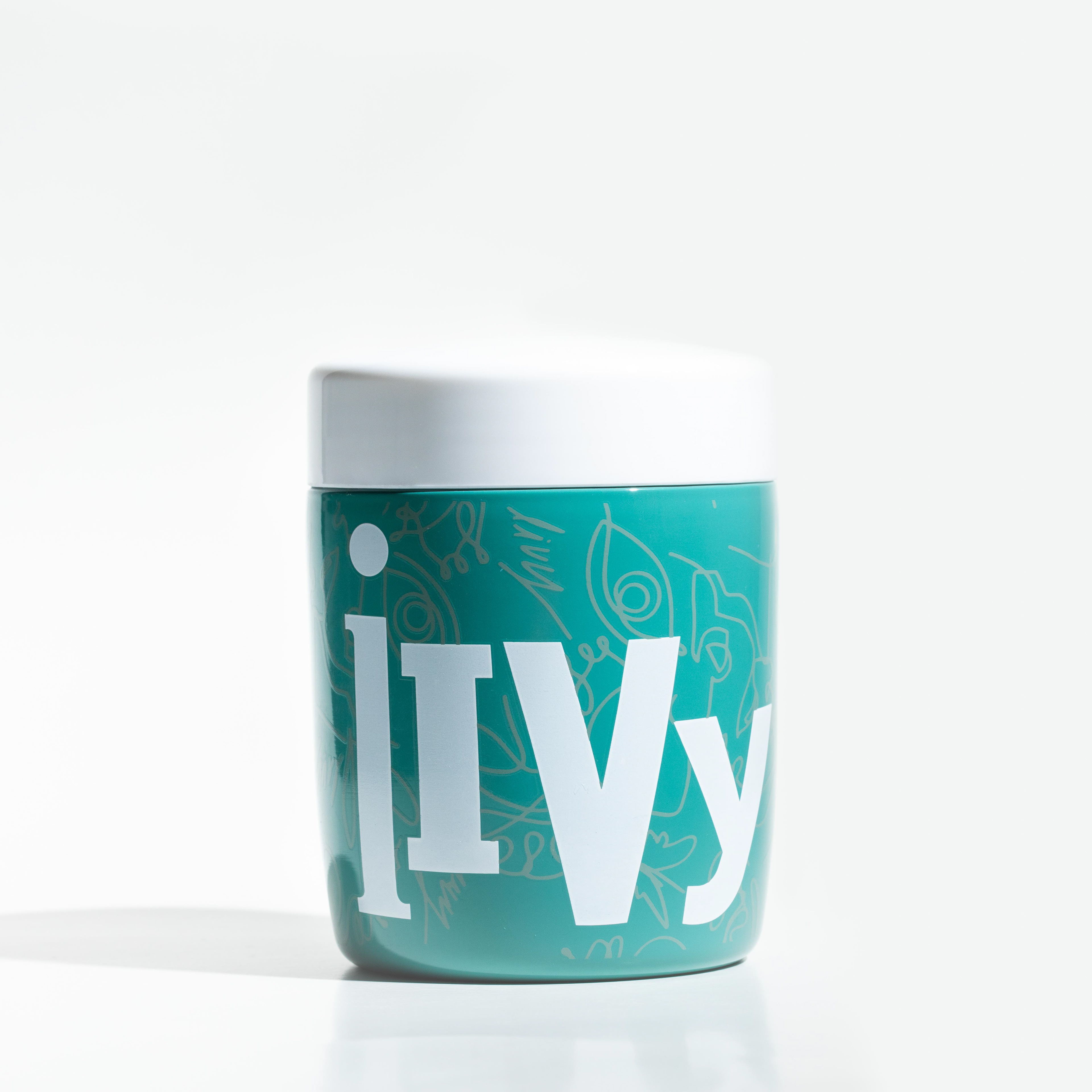 Product shot photography - Cannabis storage jar, green