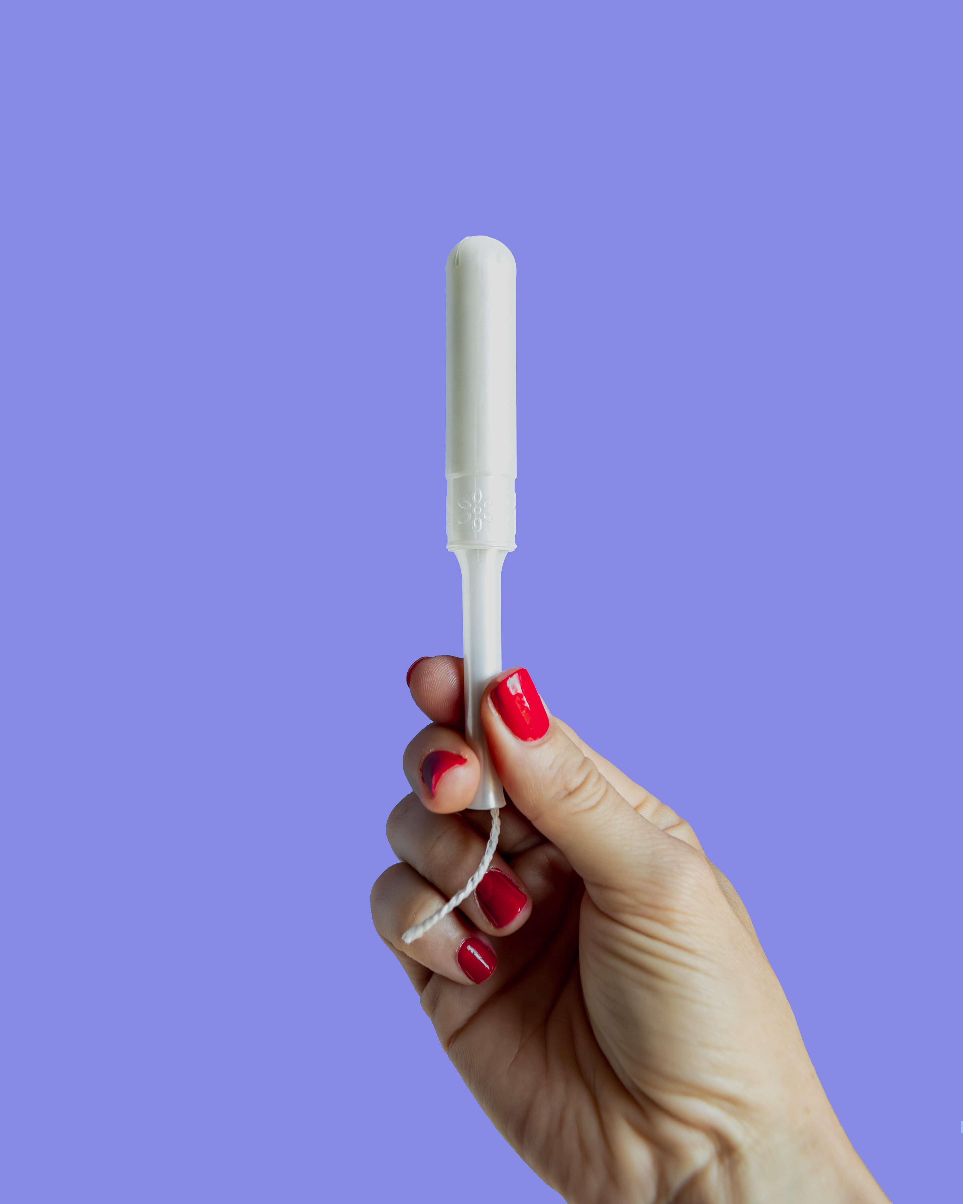 Brand photography - tampon in hand