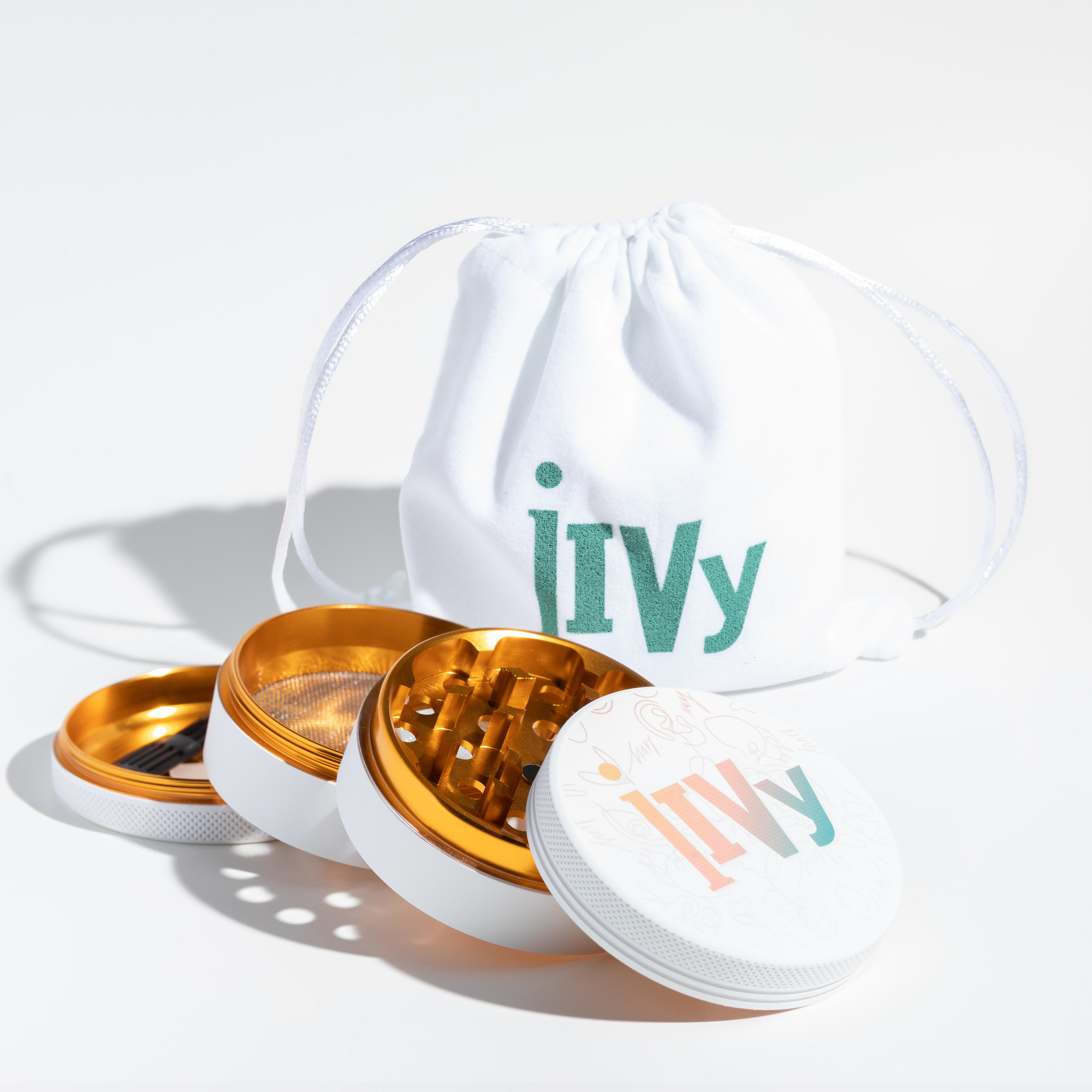 Lifestyle product photography - Cannabis Grinder, golden