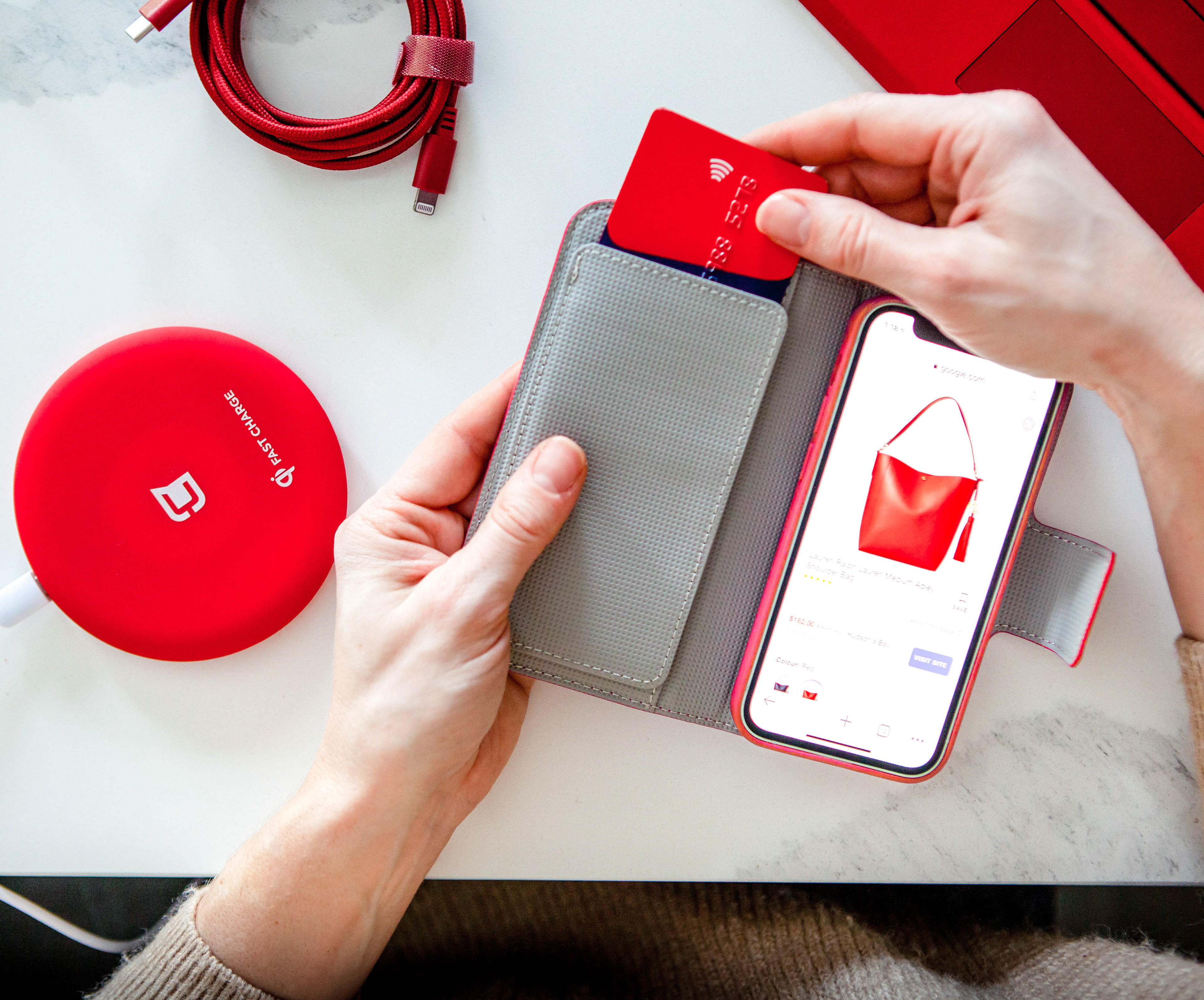 Lifestyle product photography - red tech accessories