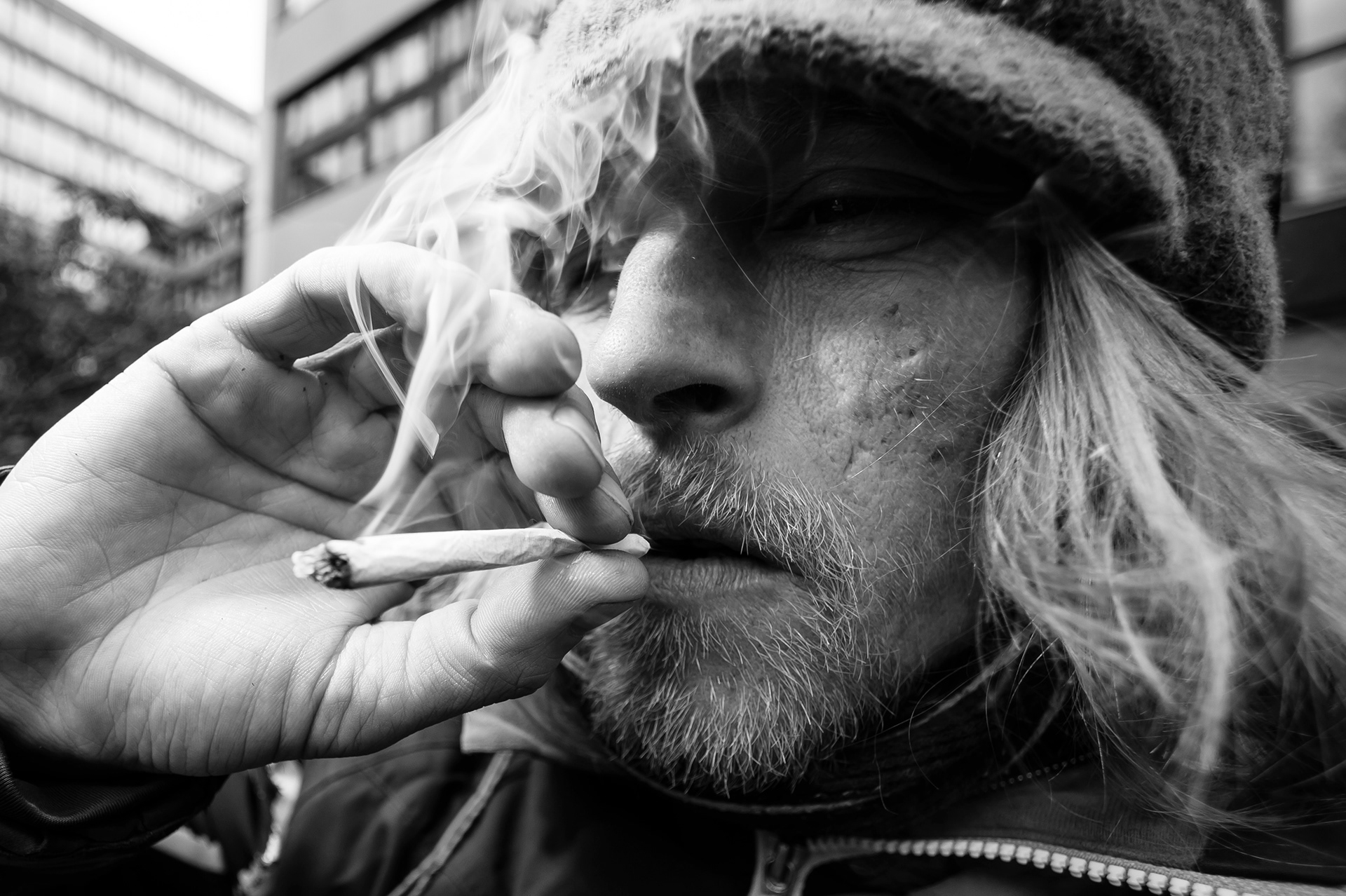 Smoking a joint using tobacco and Happy Joker, a legal high that has a similar effect to cannabis