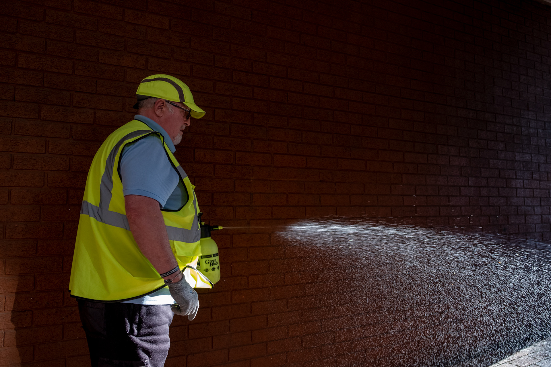 Day 45 of Lockdown- A worker from Sheffield BID disinfecting an area used as a public toilet