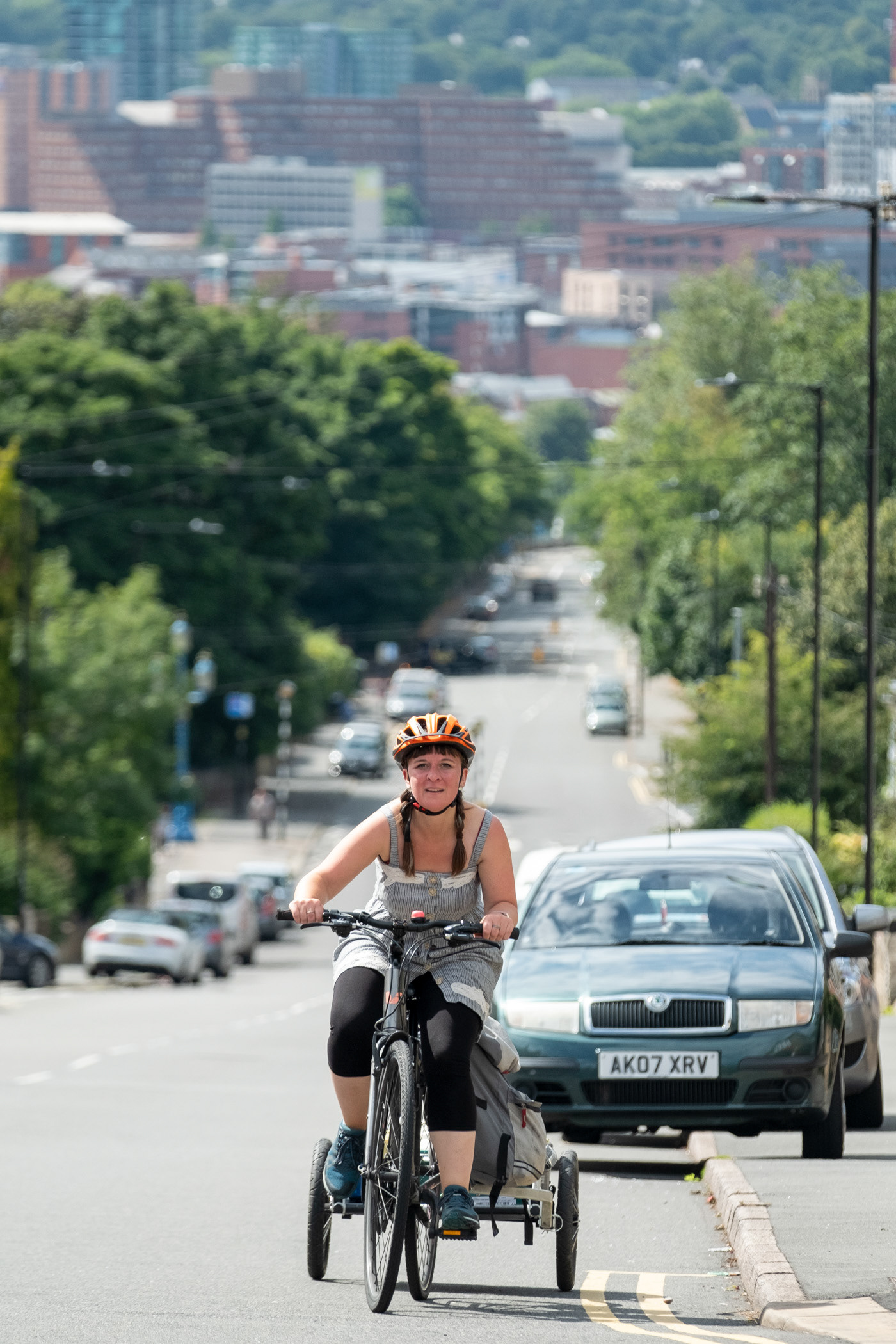 A Volunteer at the Foodhall on a bike delvery of food parcels in Sheffield