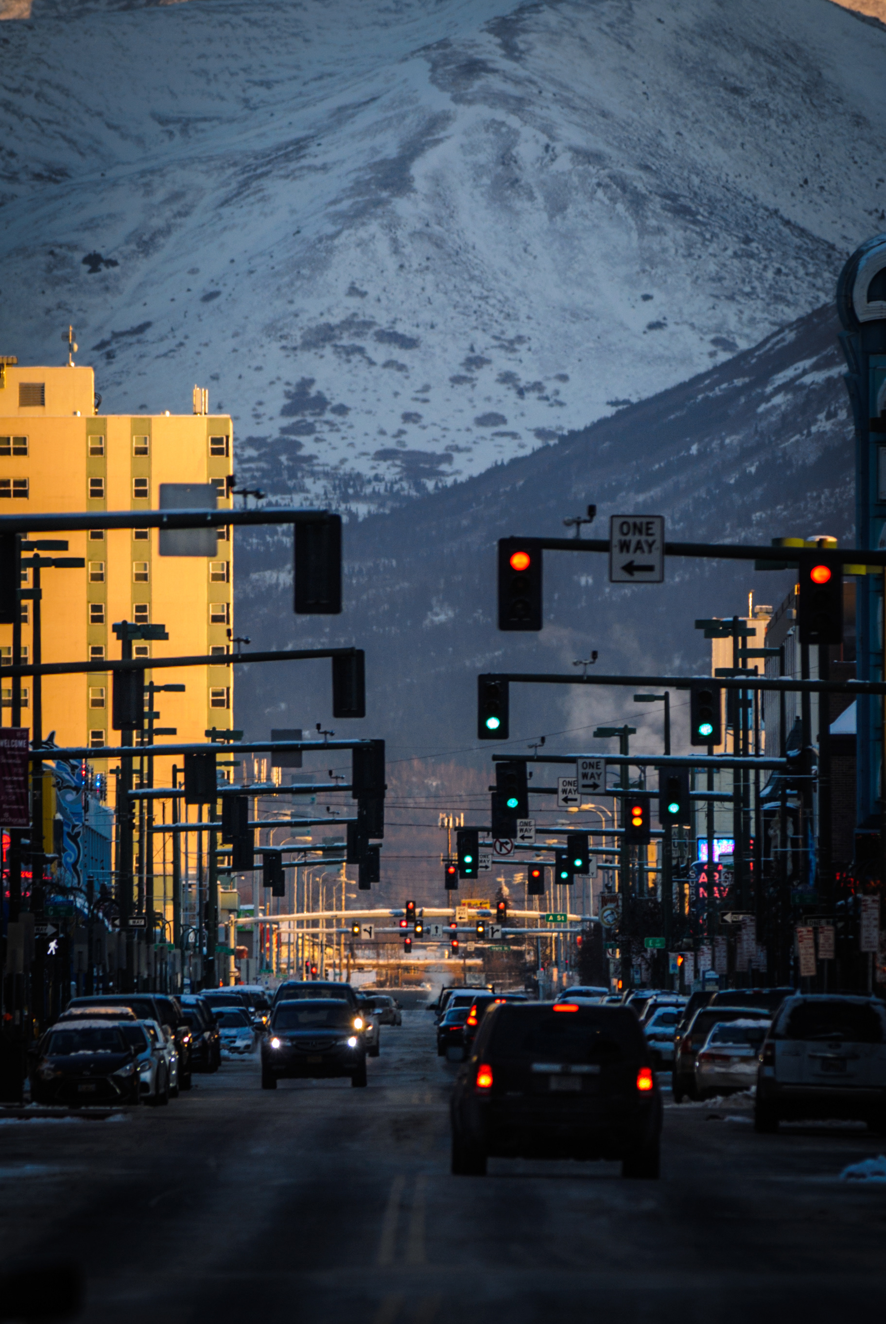 Streetlights of Anchorage, Alaska with the mountains beyond