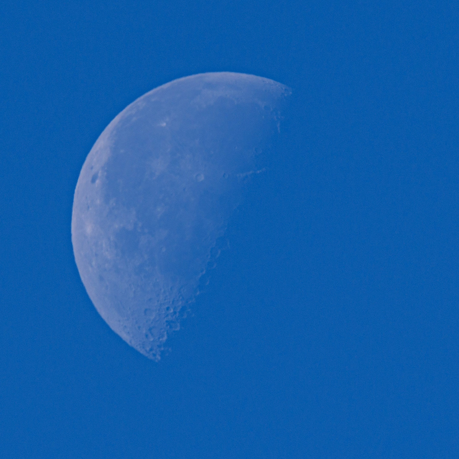 Half, moon in the day.