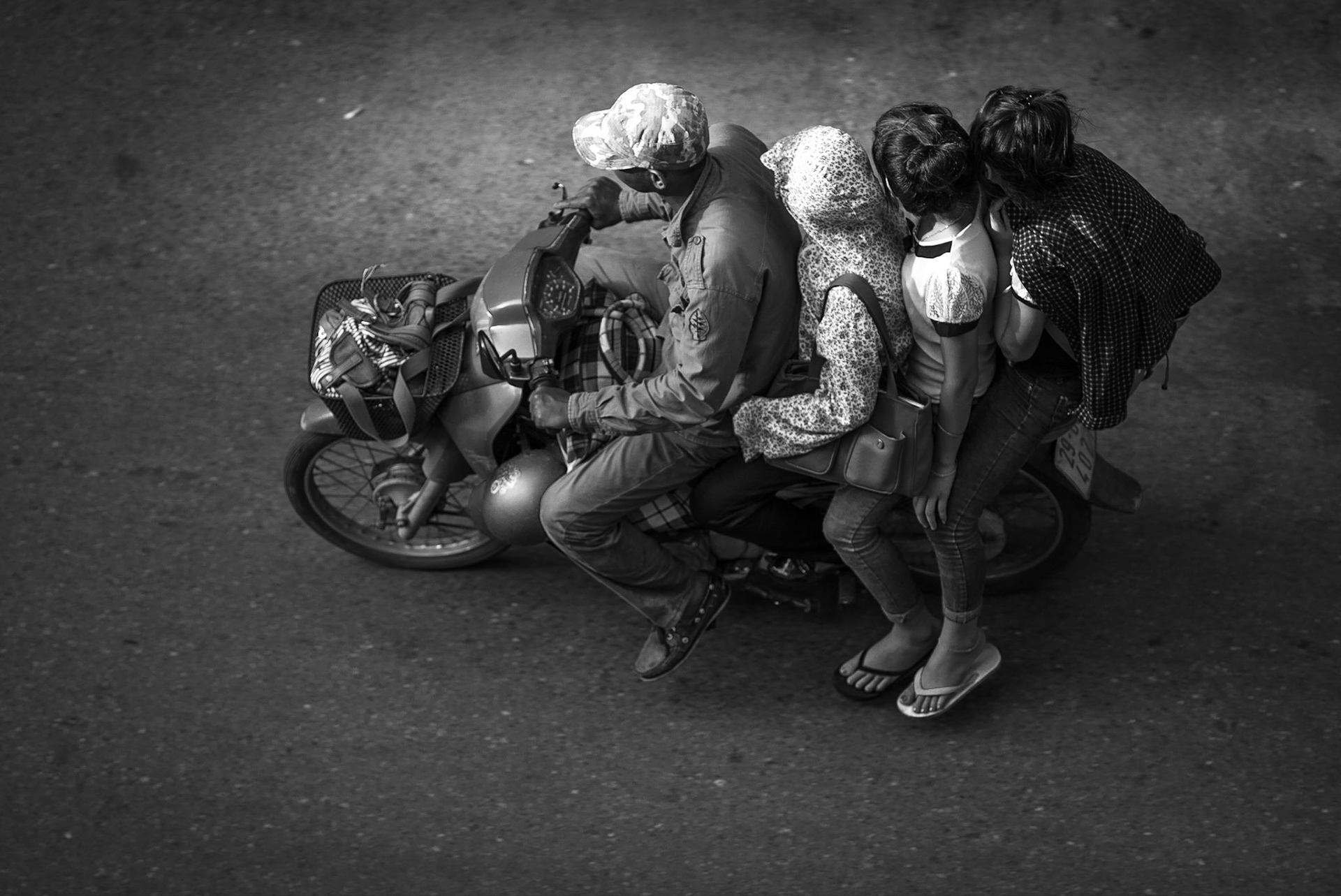 A family on their scooter in Ho Chi Min City, Vietnam, 2015.