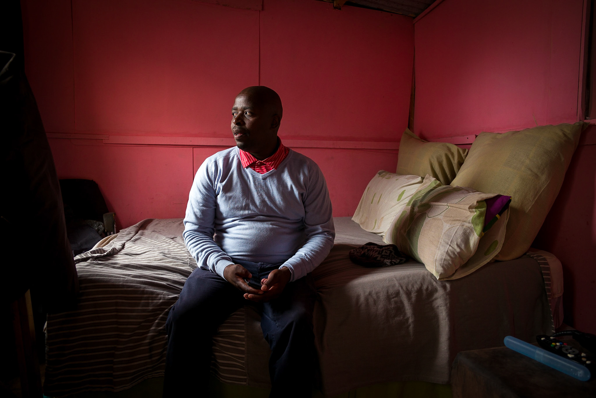 Abosh, in his home in Langa Township just outside of Cape Town, South Africa