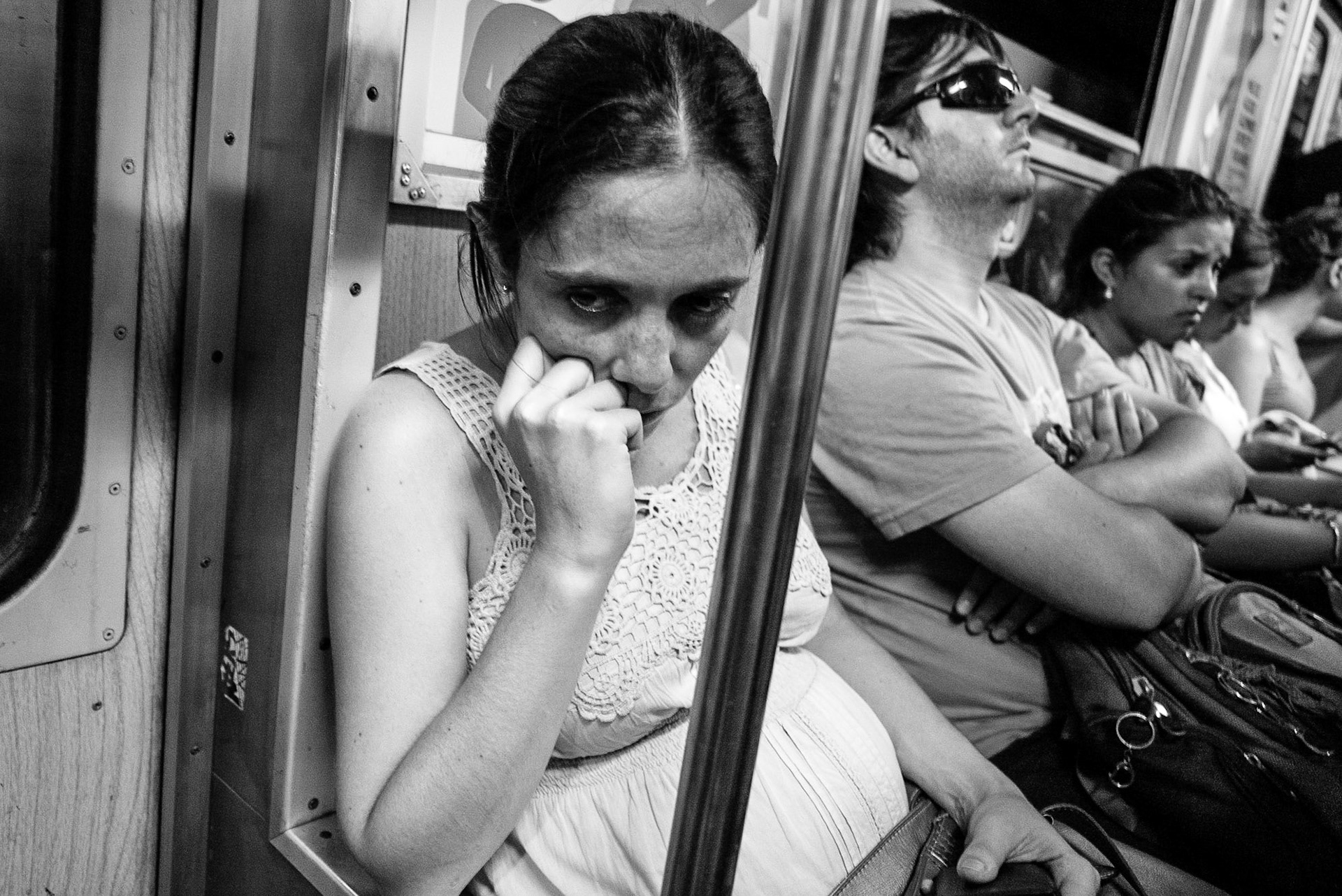 Exhausted commuters in Buenos Aires, Argentina.